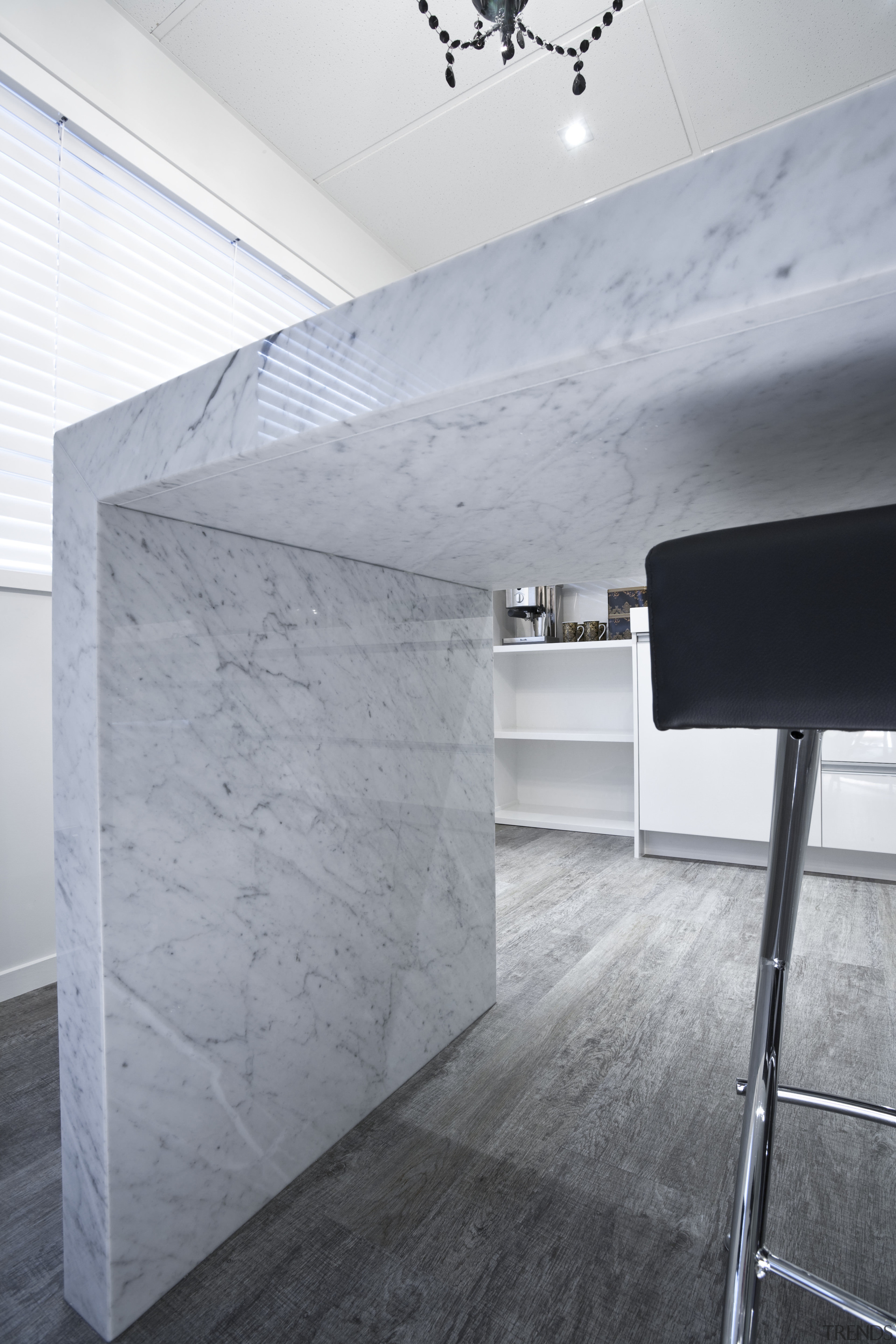 This kitchen by Yellowfox features an island with architecture, ceiling, daylighting, floor, flooring, interior design, product design, structure, wall, gray