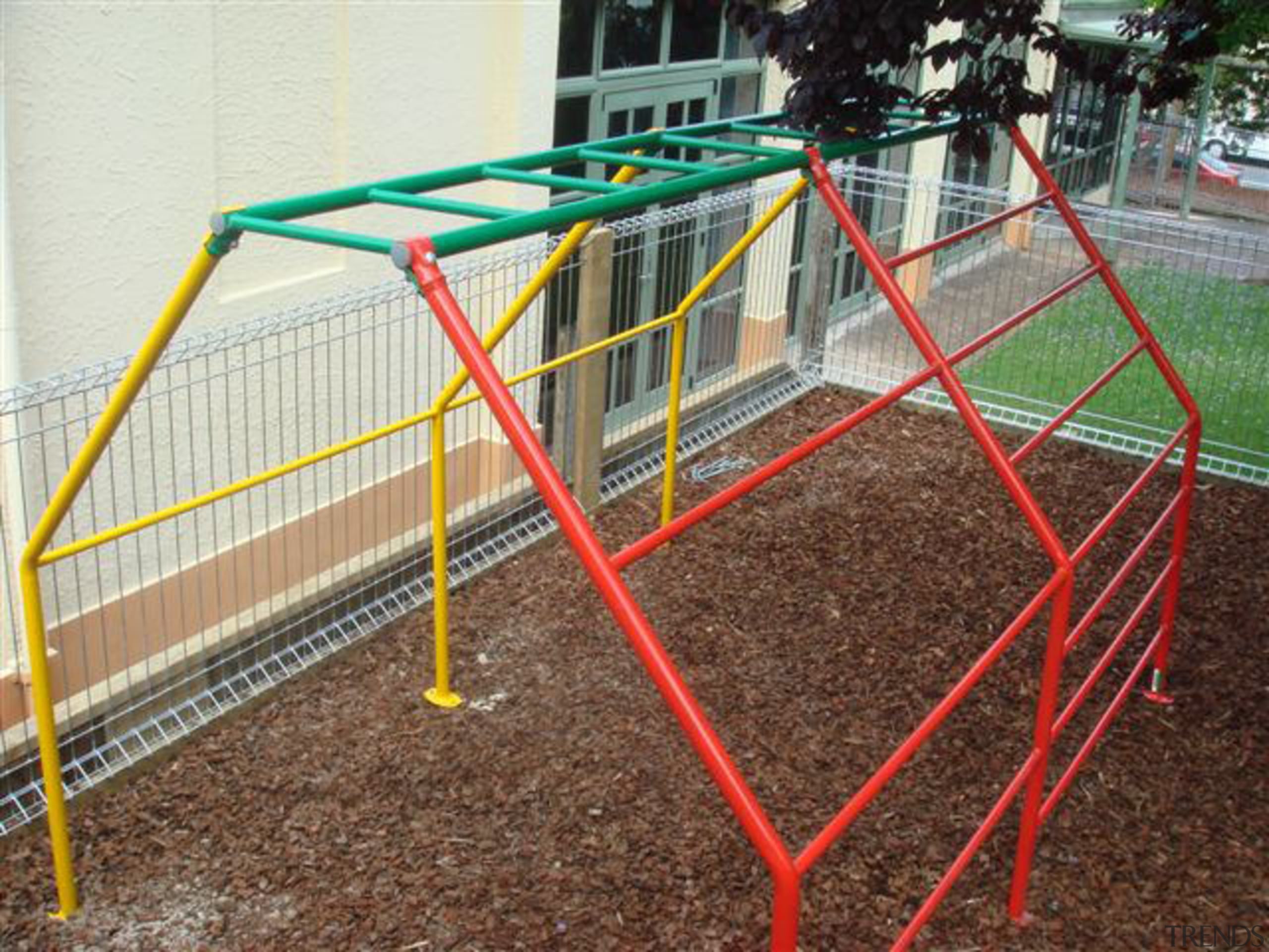 Image of outdoor play equipment created by Adams fence, line, net, outdoor play equipment, playground, public space, recreation, structure, brown