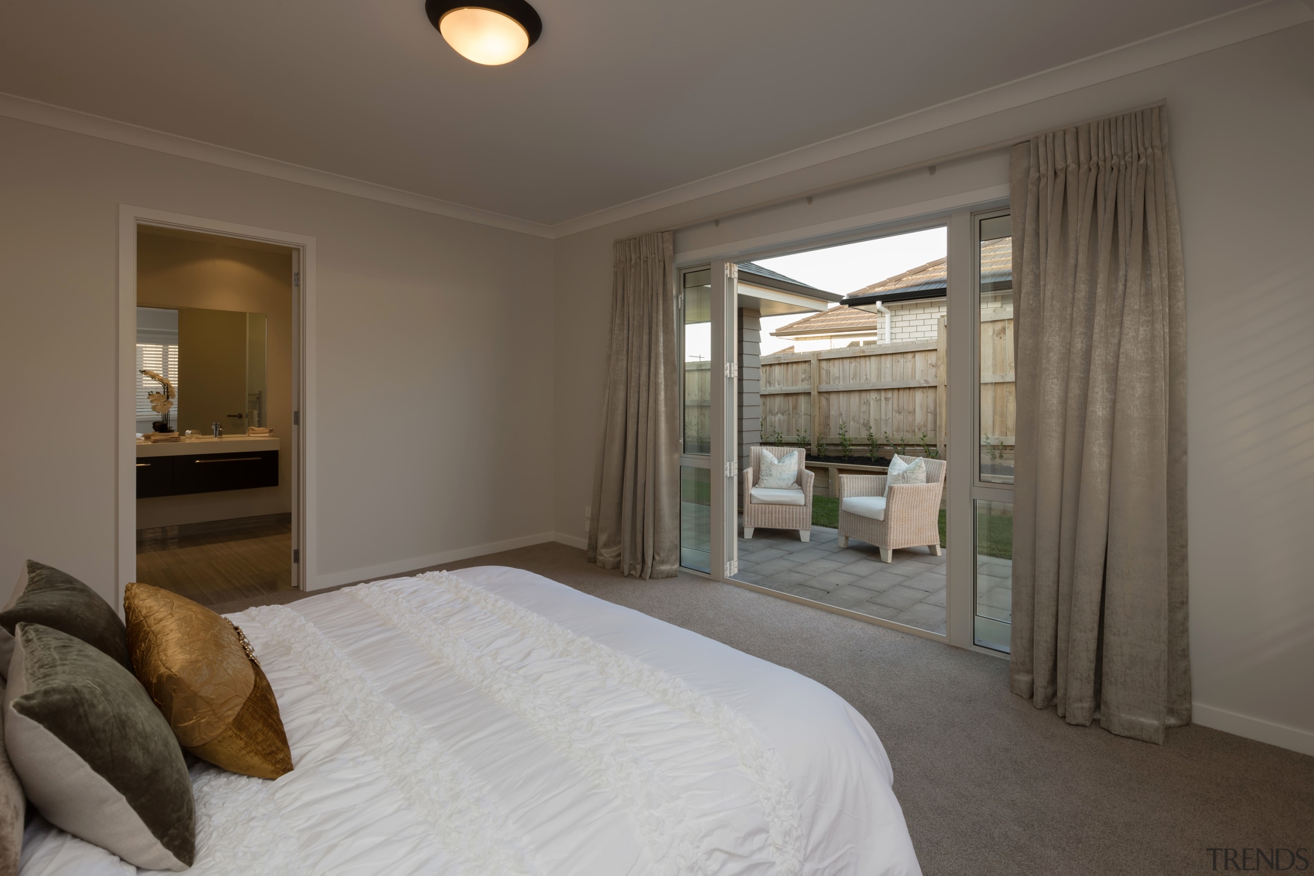 The master suite in the new Landmark Homes bedroom, ceiling, estate, home, interior design, property, real estate, room, window, wood, gray