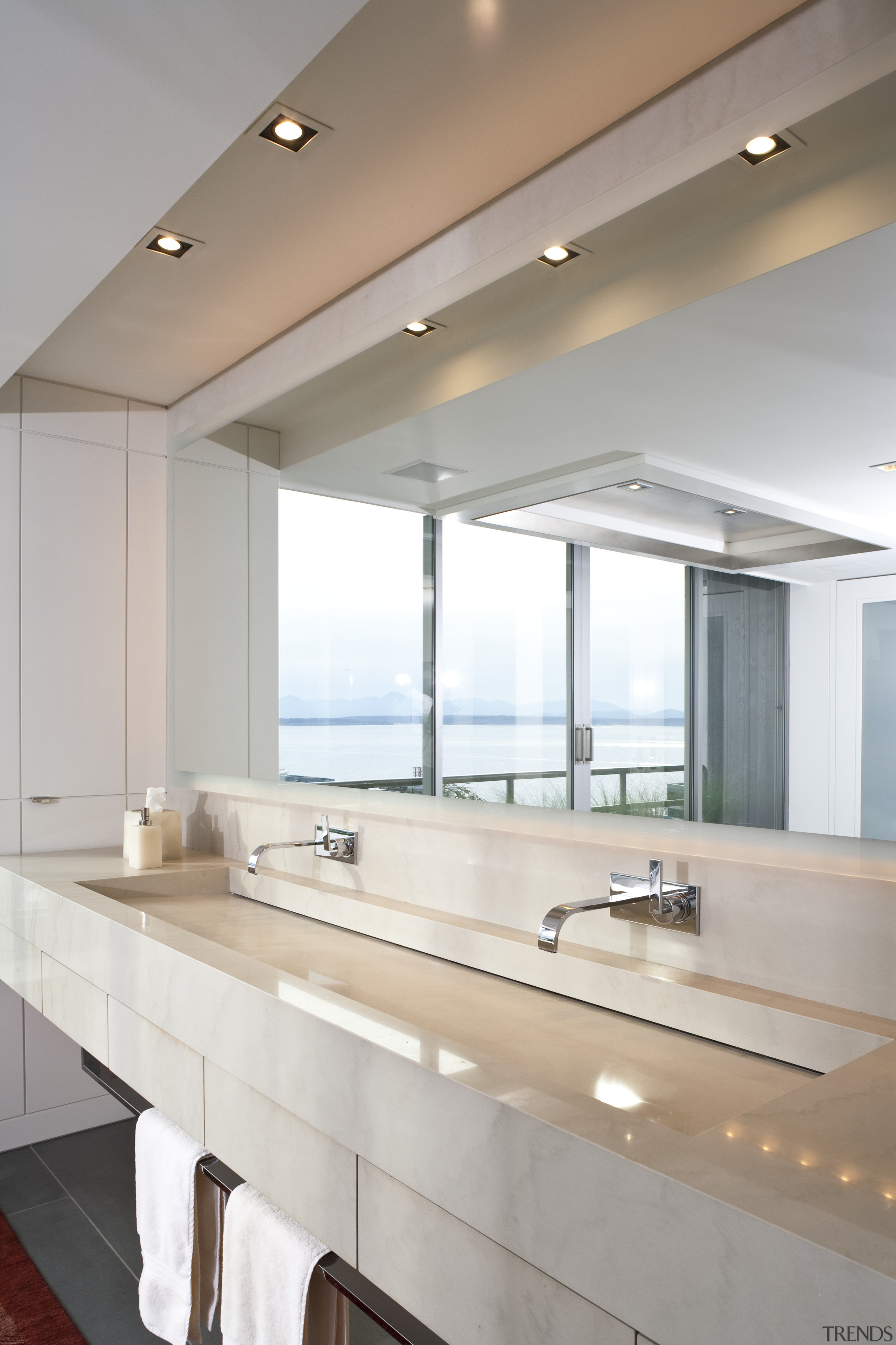 View of a bathroom which features vanity with architecture, bathroom, ceiling, countertop, daylighting, interior design, sink, gray