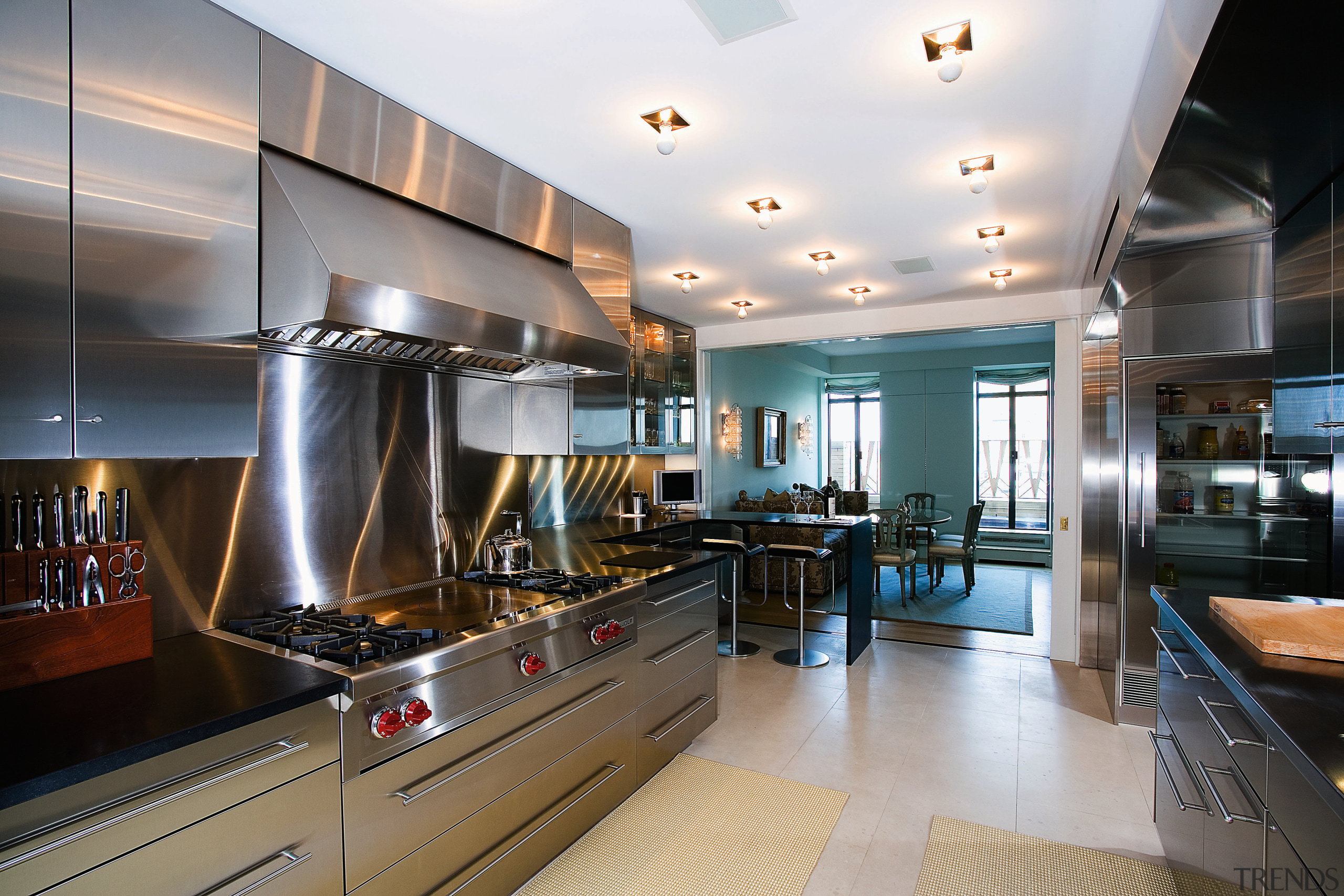 A view of a kitchen by St Charles countertop, cuisine classique, interior design, kitchen, real estate, gray, black