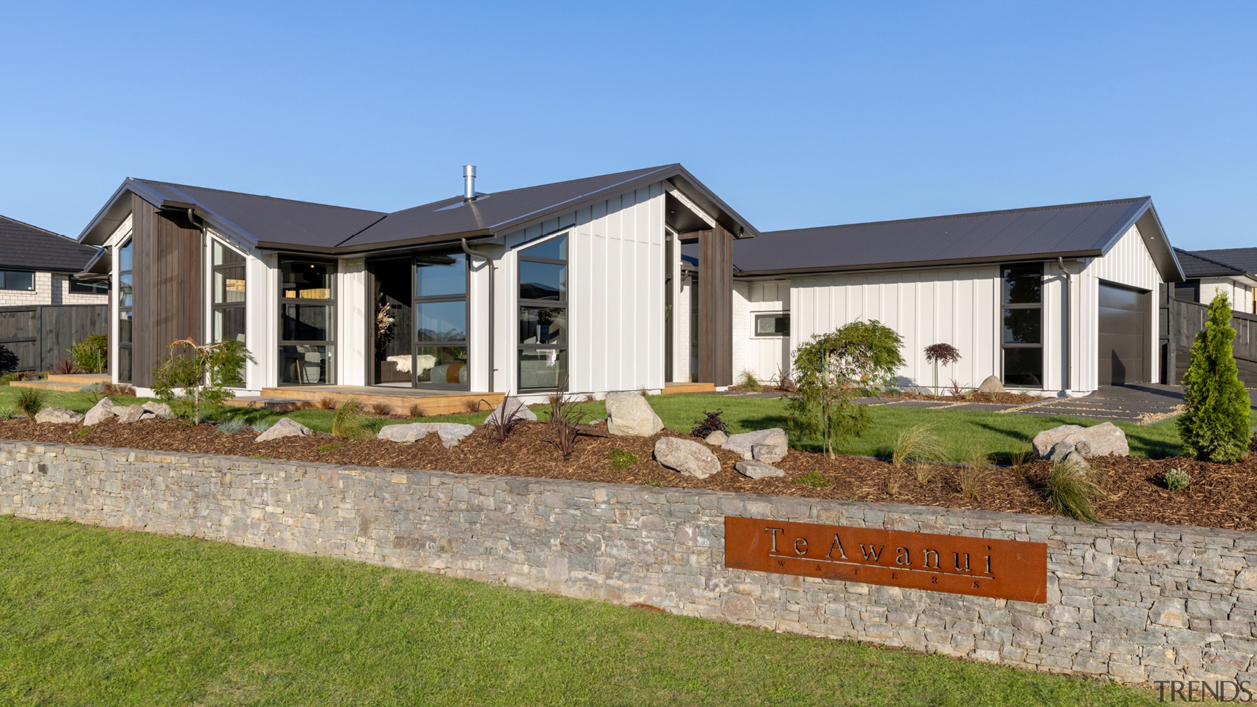 The natural toned home offers great street presence. 