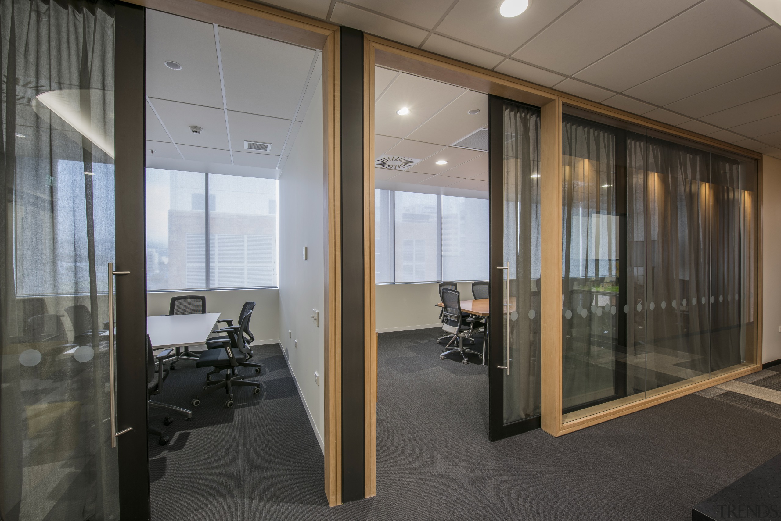 In this project, meeting rooms on the UniMed door, glass, interior design, office, real estate, window, gray, black