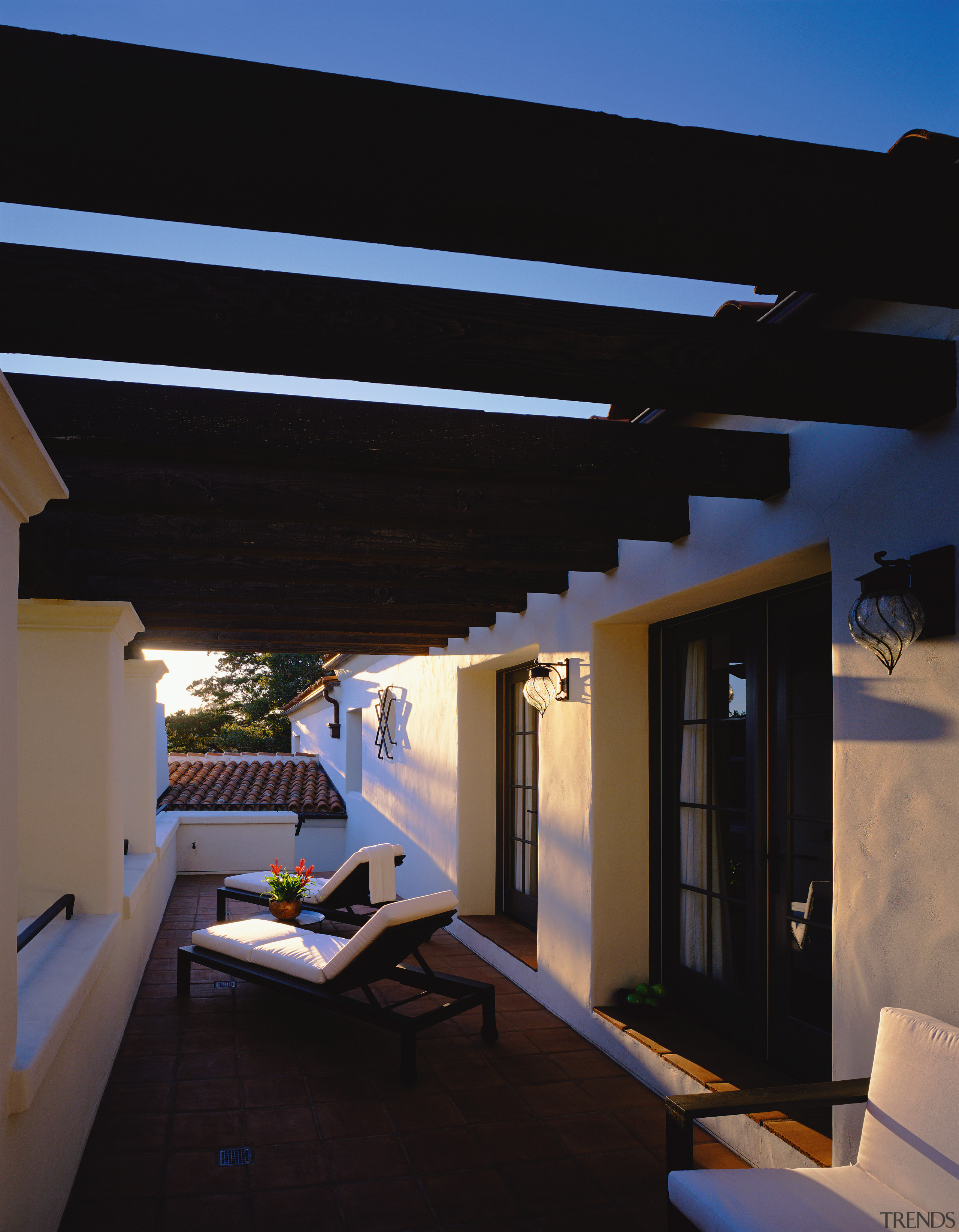 Late afternoon sun baths the upstairs terrace off architecture, ceiling, daylighting, home, house, interior design, lighting, property, real estate, roof, black