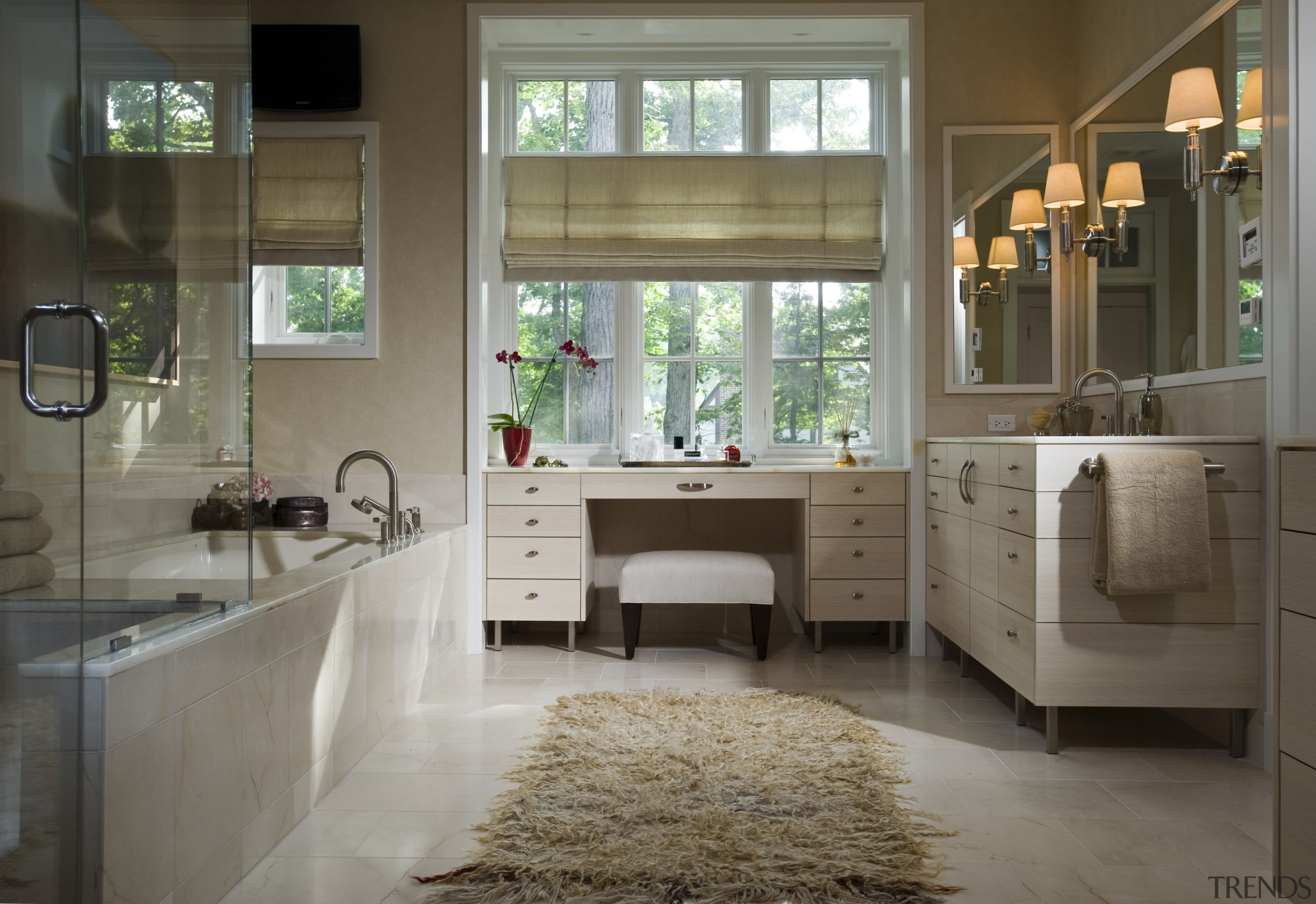 View of bathroom with light toned cabinetry and bathroom, cabinetry, countertop, floor, flooring, interior design, room, window, gray, brown