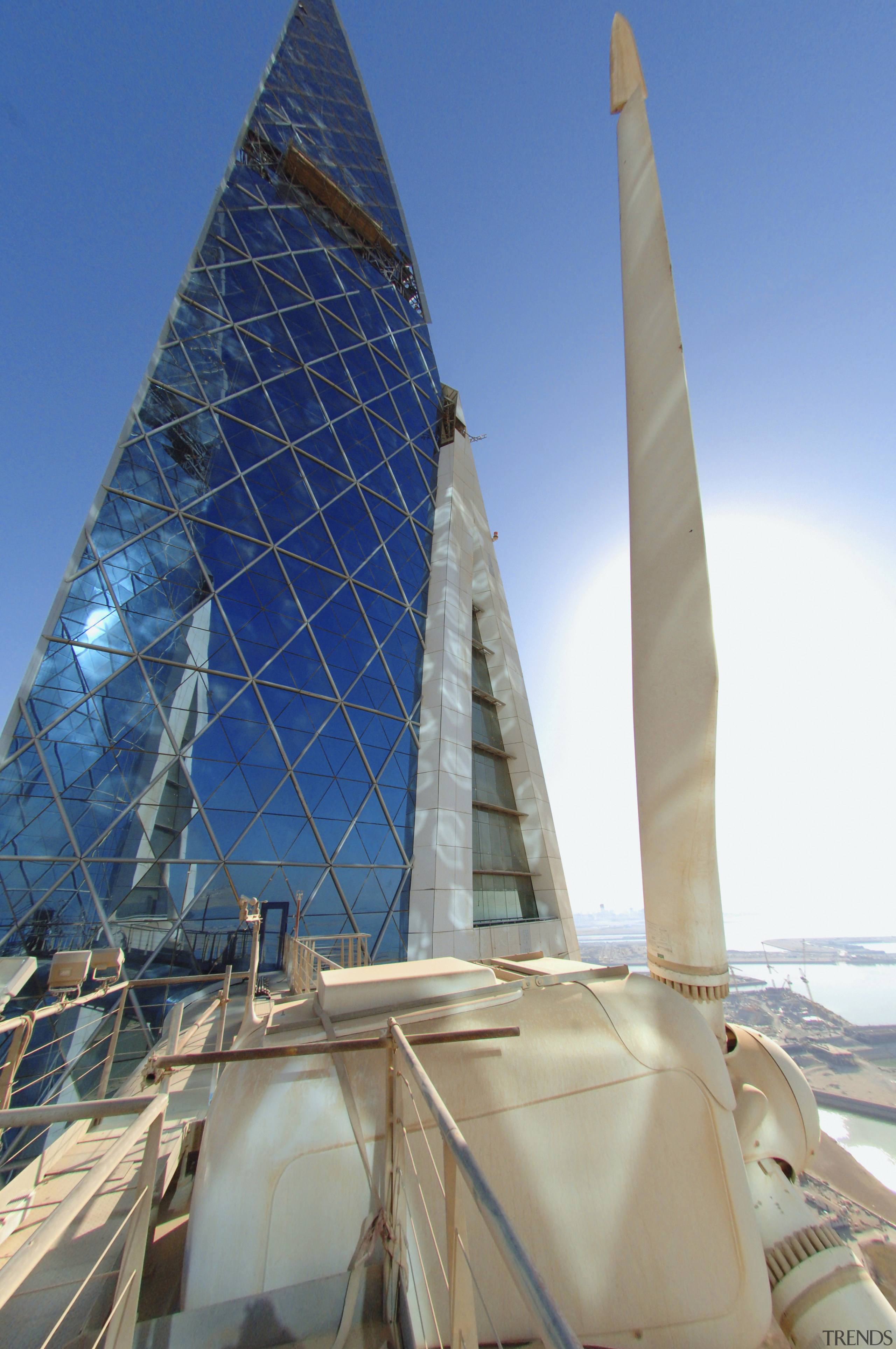 The new Bahrain world Trade Centre meets up architecture, building, daytime, sail, sky, skyscraper, tower, teal