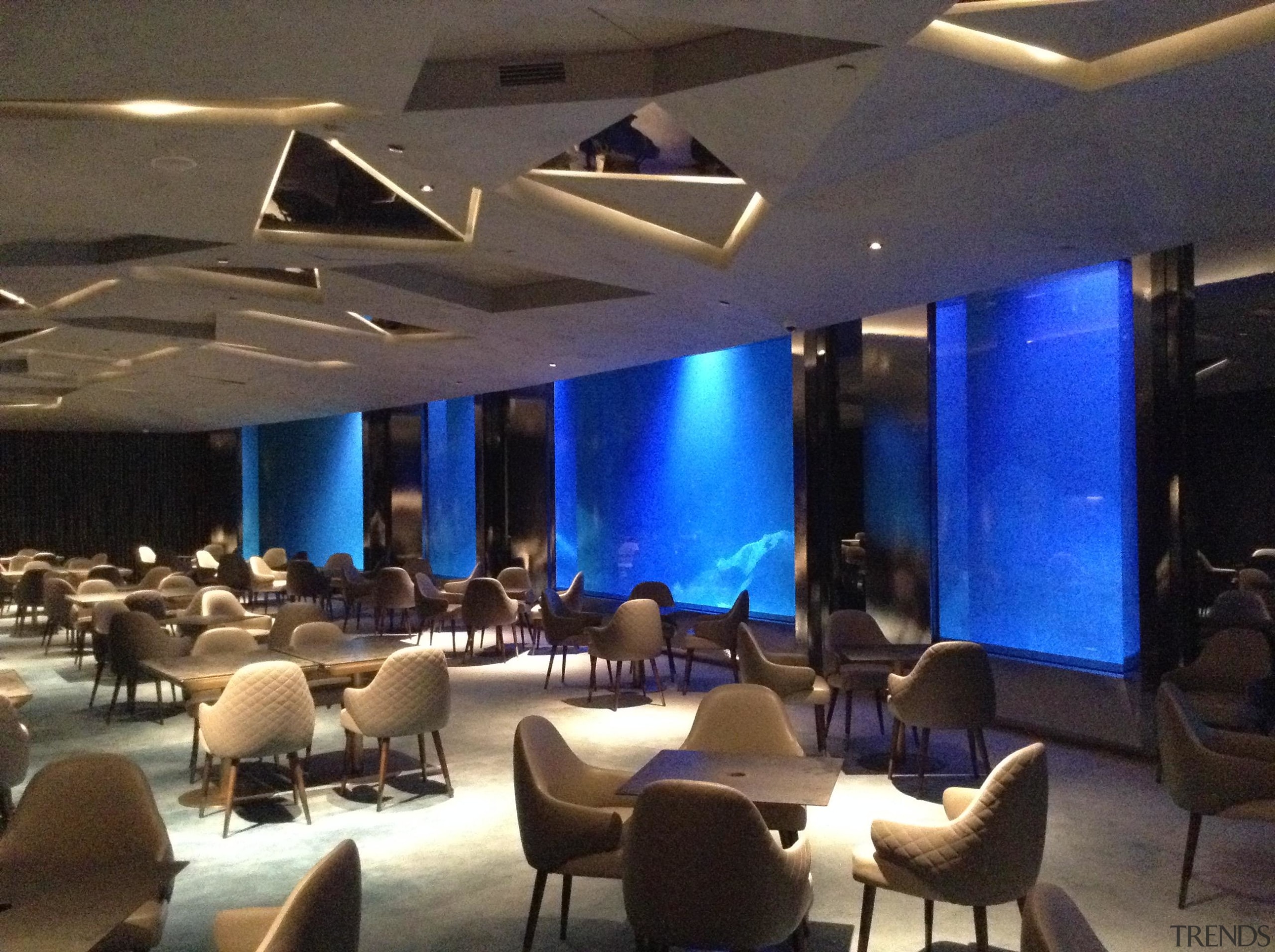 The two lowest levels are under water, with architecture, building, ceiling, conference hall, convention, convention center, design, function hall, interior design, lighting, property, resort, restaurant, room, black