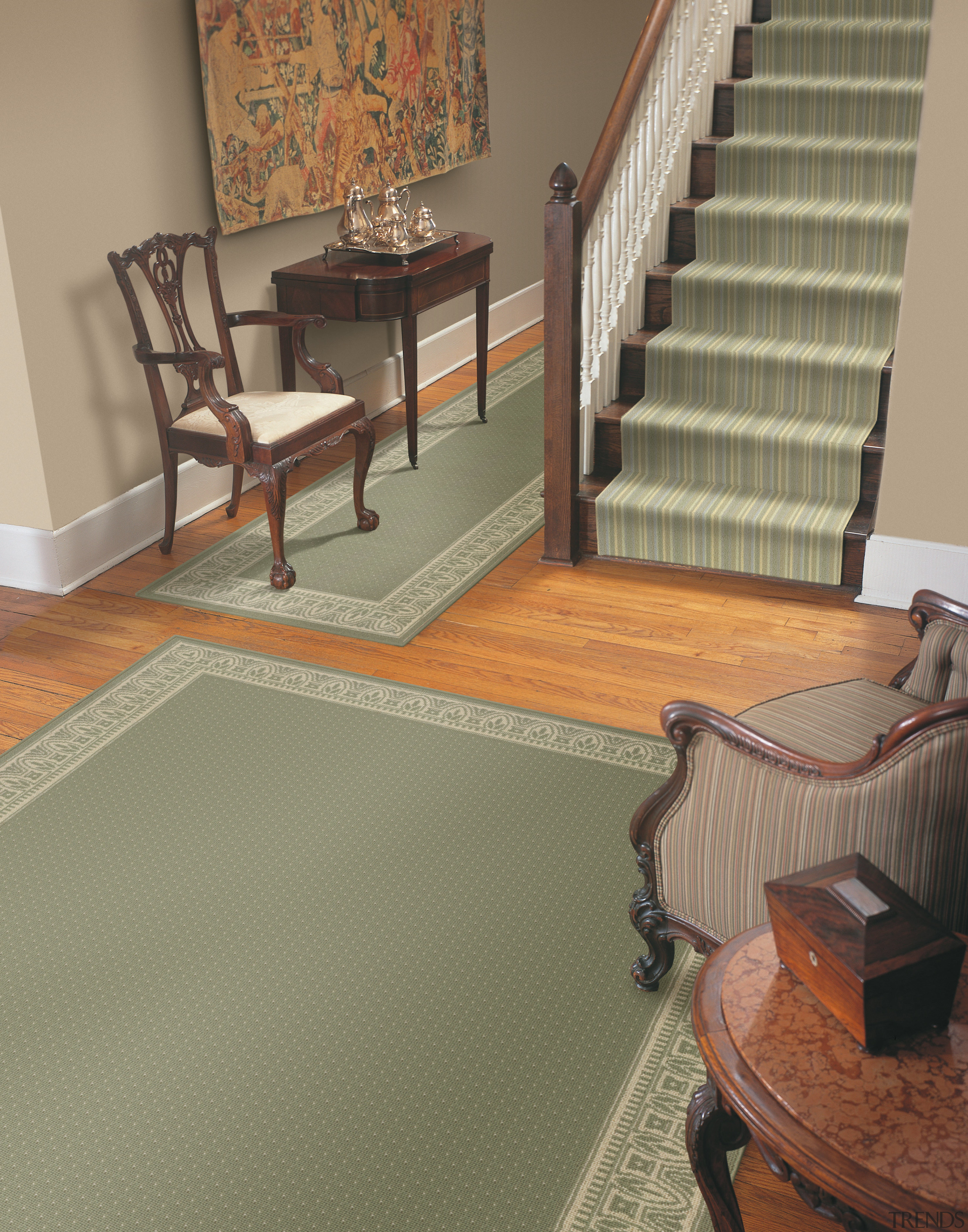 A view of a hallway, wooden flooring, grey carpet, floor, flooring, hardwood, interior design, laminate flooring, living room, room, tile, wall, wood, wood flooring, brown