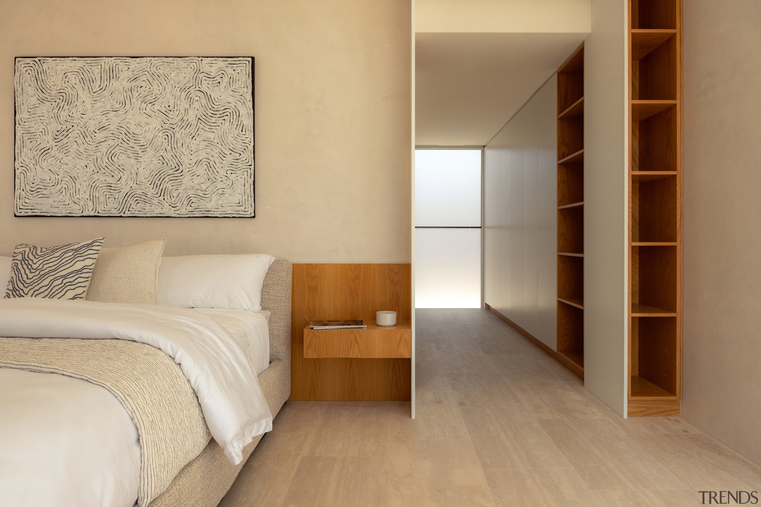Master bedroom with niche wood-lined open storage. 