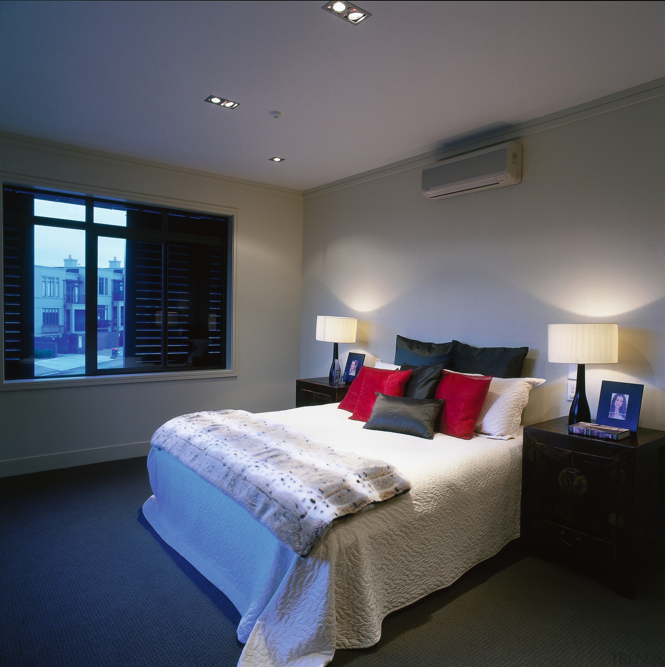 Bedroom with light coloured bedding, bright cushions, bedside bedroom, ceiling, home, interior design, real estate, room, suite, wall, window, gray, black