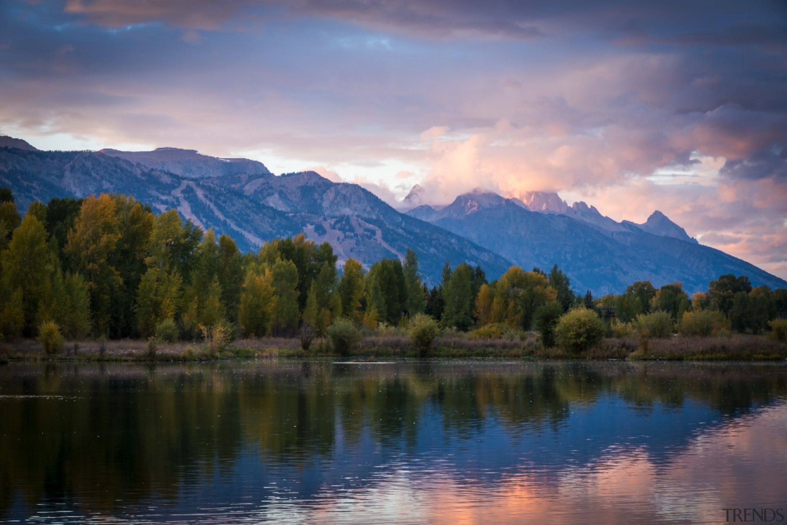 The setting is unparalleled - The setting is atmosphere, bank, cloud, computer wallpaper, dawn, daytime, evening, fell, fjord, highland, lake, landscape, loch, morning, mount scenery, mountain, mountain range, mountainous landforms, national park, nature, reflection, reservoir, river, sky, sunlight, tree, water, wilderness, blue