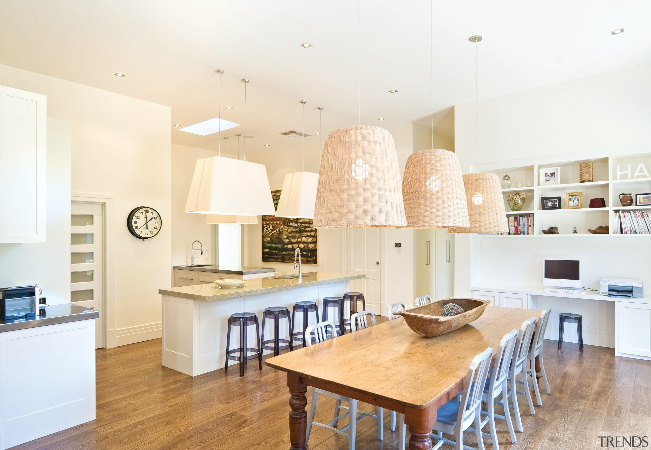 View of a kitchen and dining area featuring ceiling, countertop, cuisine classique, dining room, floor, flooring, home, interior design, kitchen, property, real estate, room, table, white