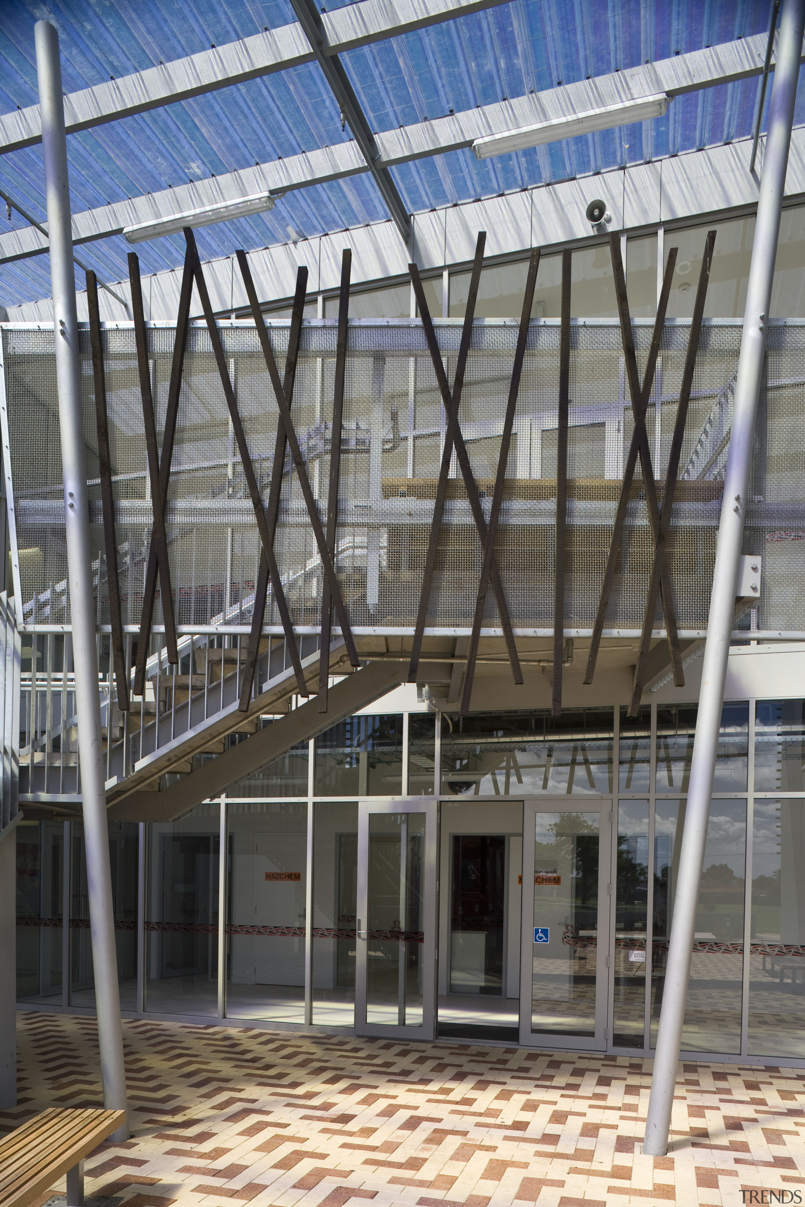 Exterior view of school with stairways which feature architecture, building, commercial building, daylighting, facade, handrail, real estate, roof, steel, structure, gray, black