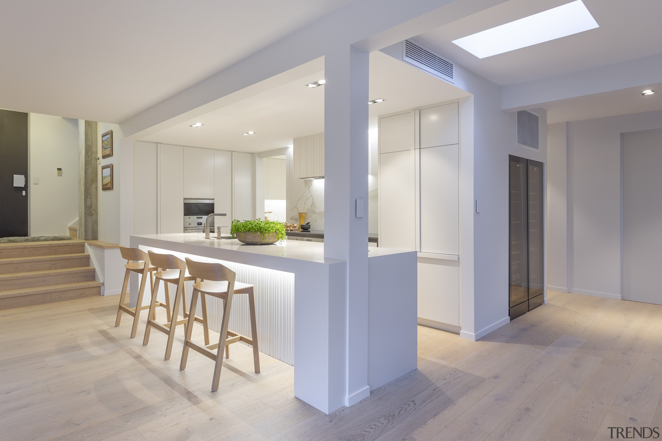 One of the challenges was to ensure the apartment, architecture, building, ceiling, daylighting, floor, flooring, furniture, hardwood, home, house, interior design, kitchen, loft, property, real estate, room, table, wood, wood flooring, gray