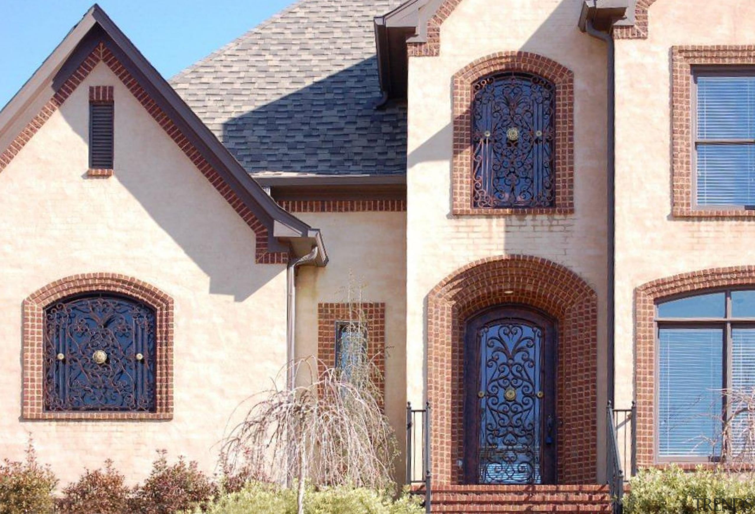 Iron craftsmanship by The Iron Door Company - arch, brick, brickwork, building, door, estate, facade, historic house, home, house, medieval architecture, property, real estate, roof, wall, window, white