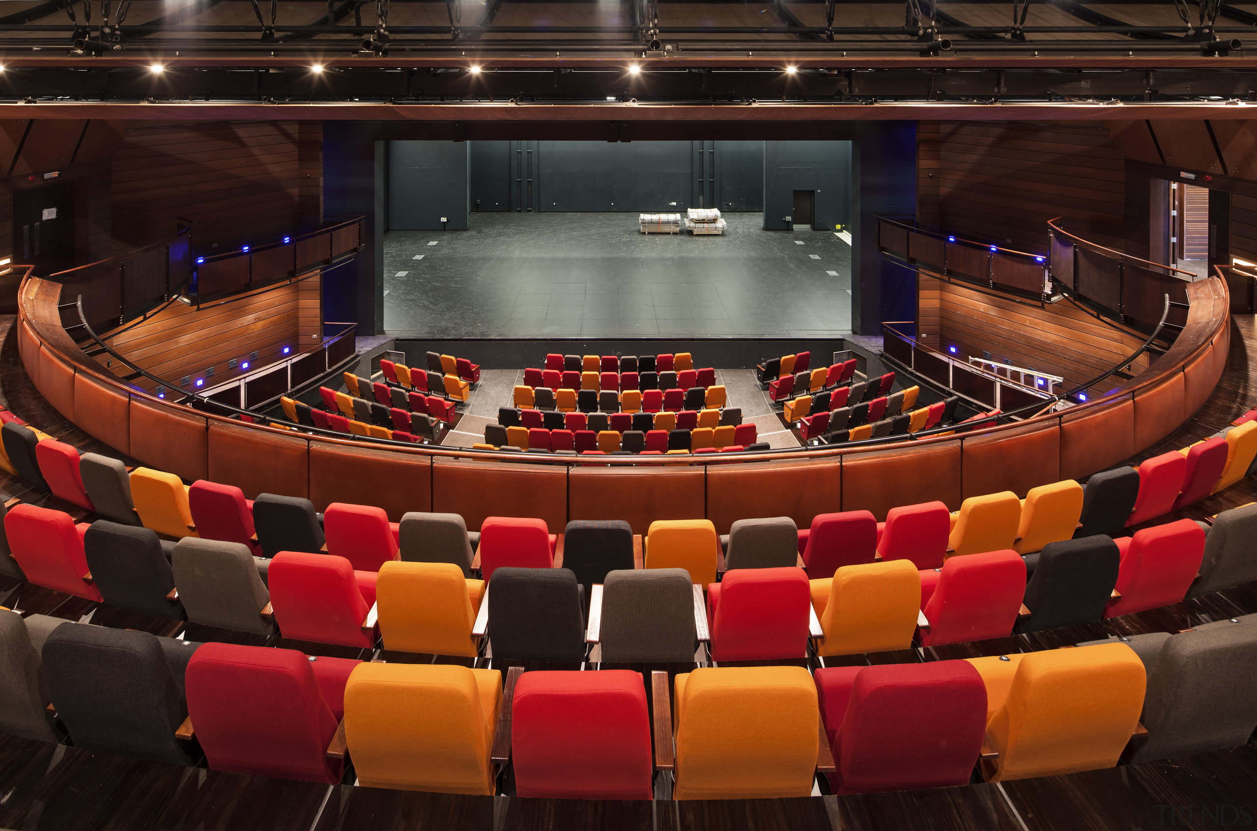 :The initial brief called for a traditional theatre auditorium, concert hall, performing arts center, stage, theatre, red