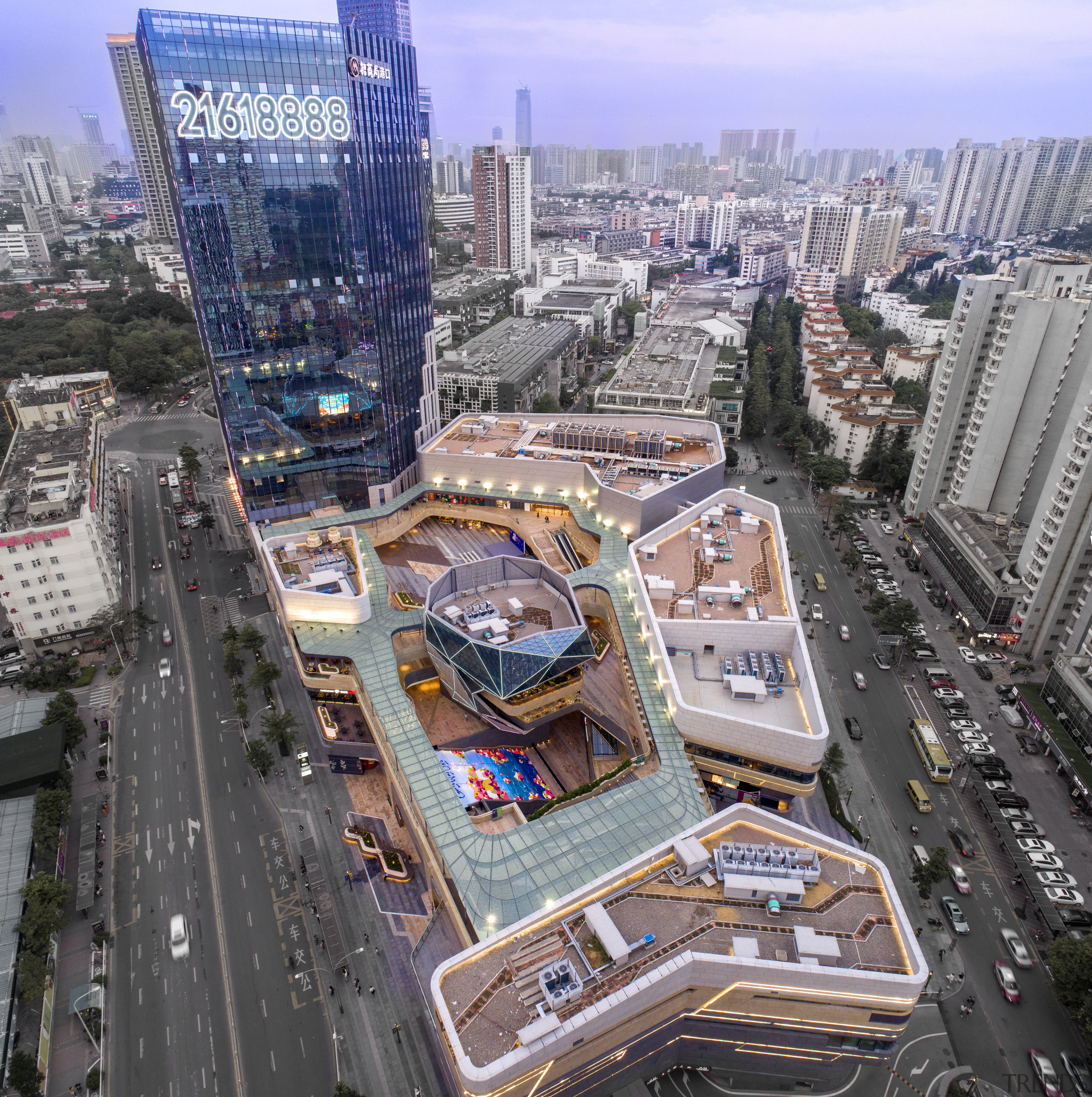 Two central courtyards flank the central lantern structure aerial photography, bird's eye view, building, city, cityscape, condominium, downtown, metropolis, metropolitan area, mixed use, neighbourhood, skyline, skyscraper, tower, tower block, urban area, urban design, gray