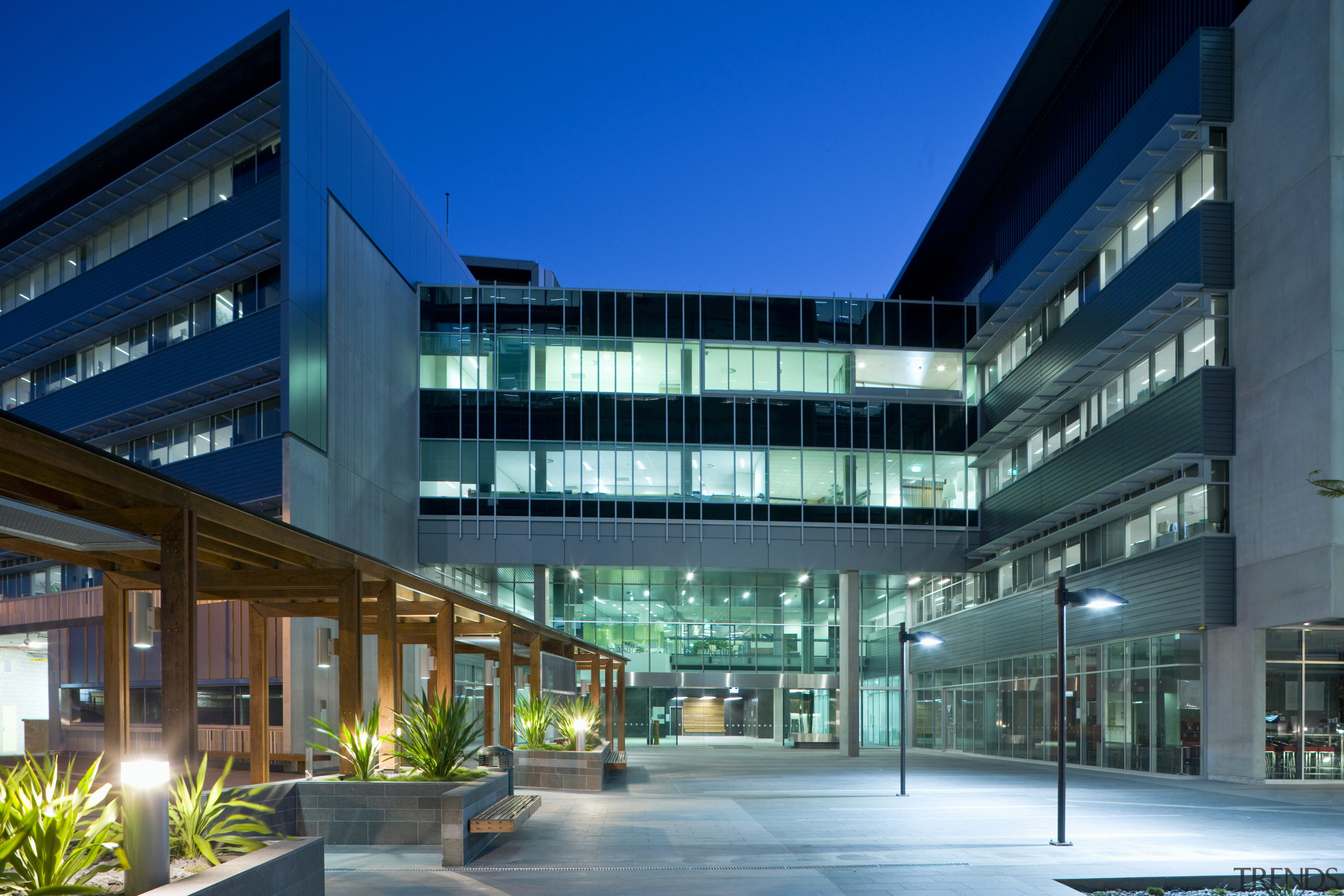 The plaza that connects the North and South apartment, architecture, building, commercial building, condominium, convention center, corporate headquarters, estate, facade, headquarters, home, hotel, leisure centre, metropolitan area, mixed use, property, real estate, residential area, blue, teal