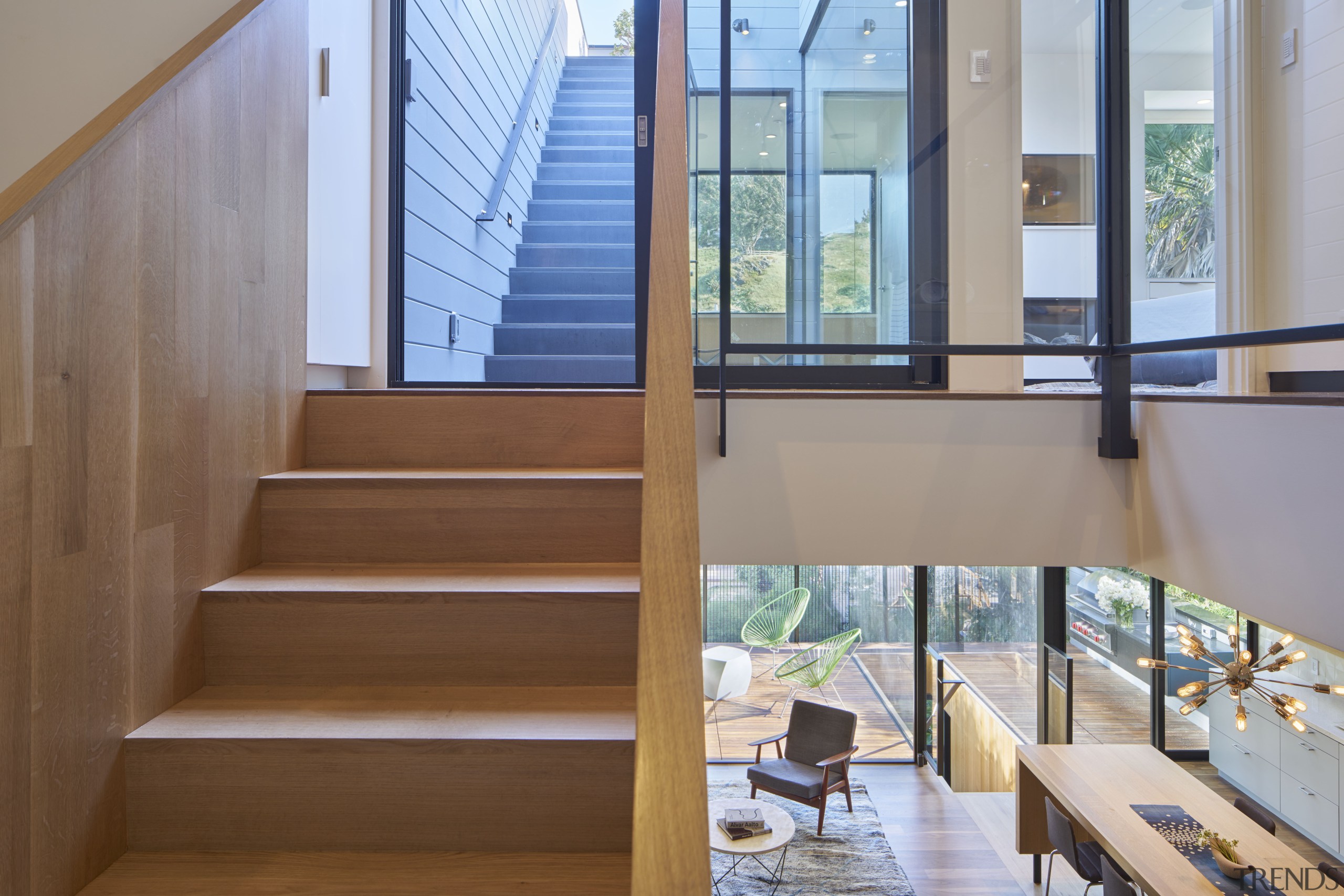 This kitchen connects to two outdoor living spaces architecture, daylighting, handrail, house, interior design, real estate, stairs, gray, brown