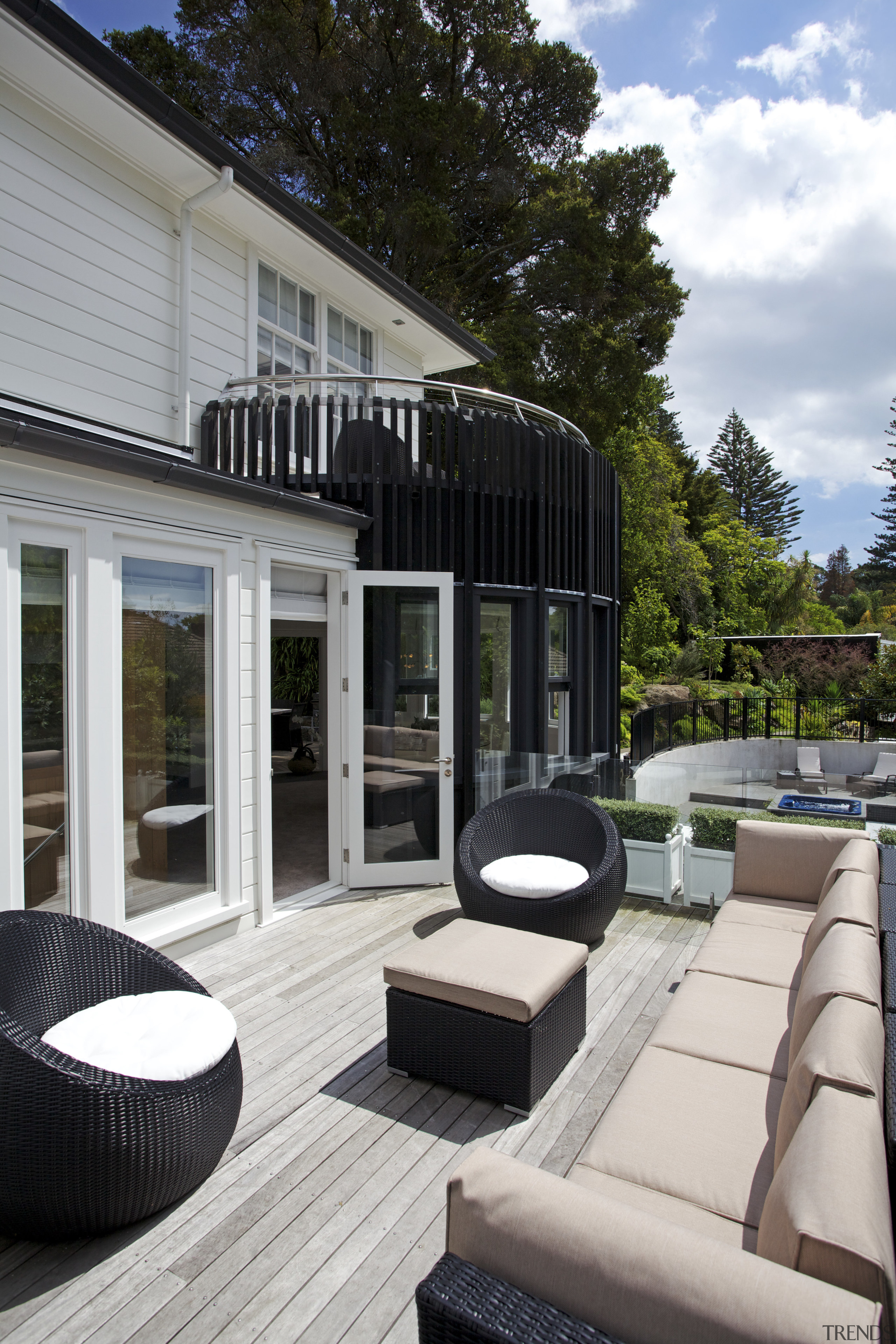 Renovated Omana Lodge by Constable Hurst Architects deck, house, outdoor structure, patio, gray, black