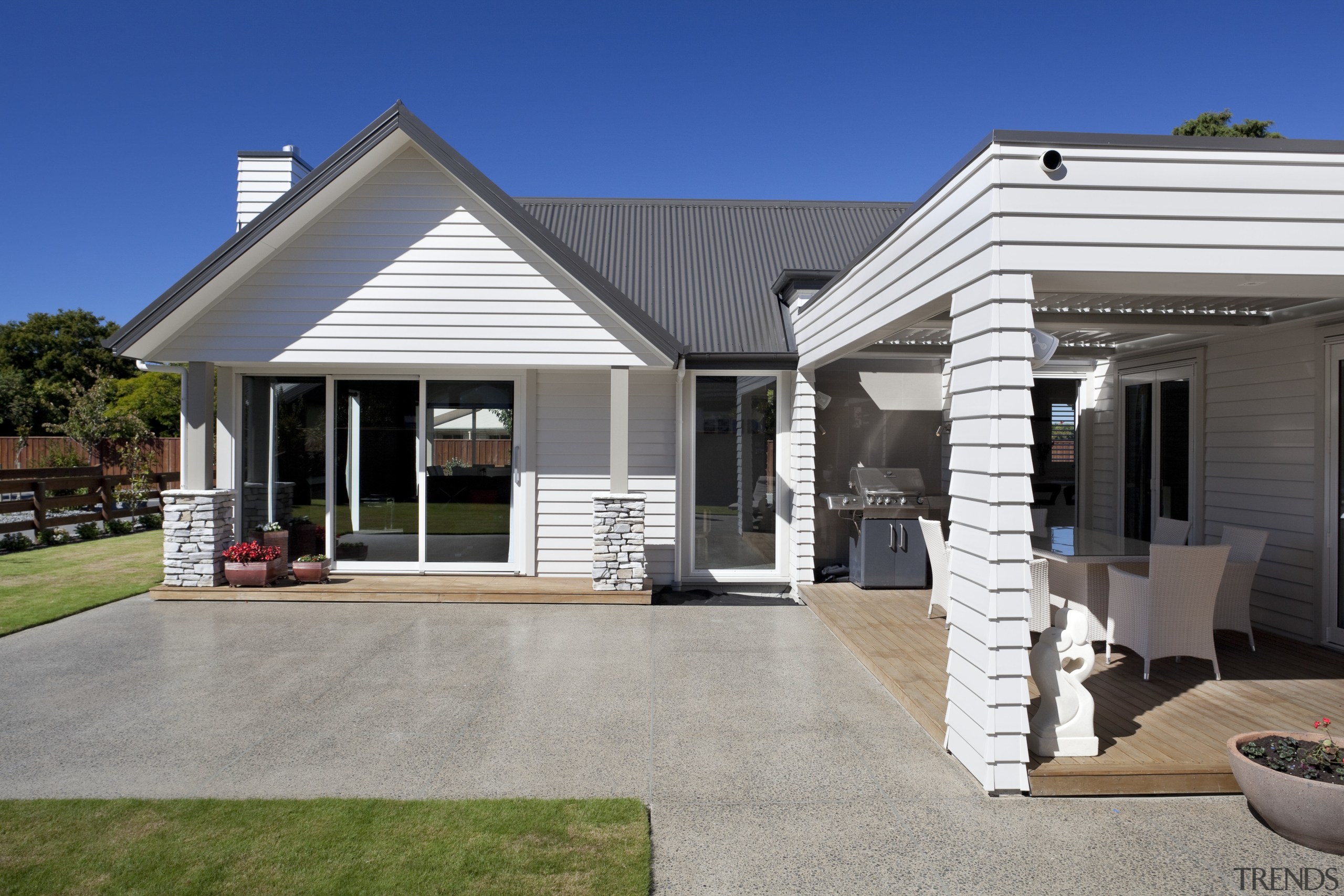 Exterior of house with white cladding and grey elevation, estate, facade, home, house, property, real estate, residential area, siding, window, gray