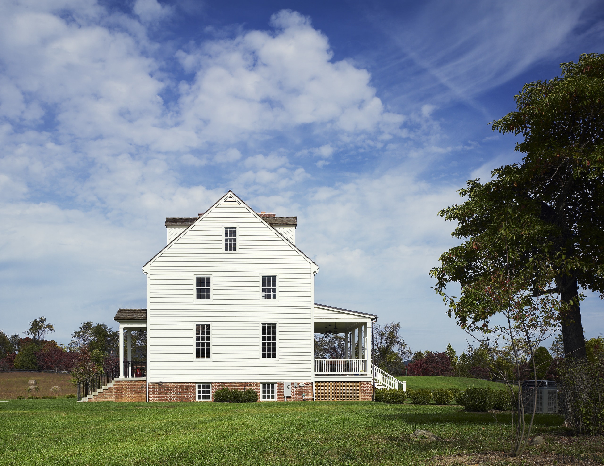 This home was built by Tom Glass of architecture, building, cloud, cottage, daytime, estate, facade, farmhouse, grass, home, house, manor house, mansion, property, real estate, residential area, rural area, sky, suburb, tree, villa, teal