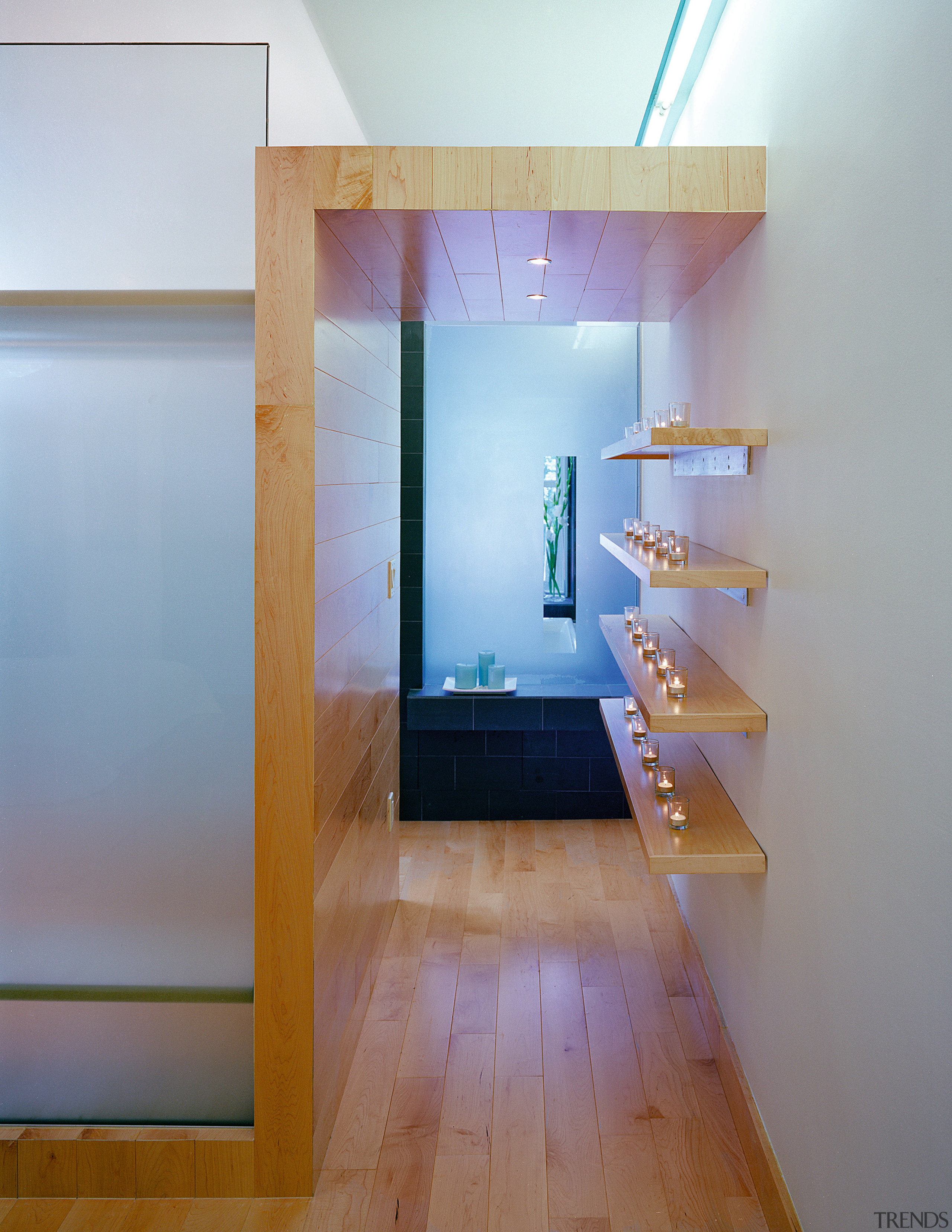 A close up view of the wooden shelving. architecture, ceiling, daylighting, floor, flooring, glass, hardwood, house, interior design, room, shelf, stairs, wall, wood, wood flooring, gray