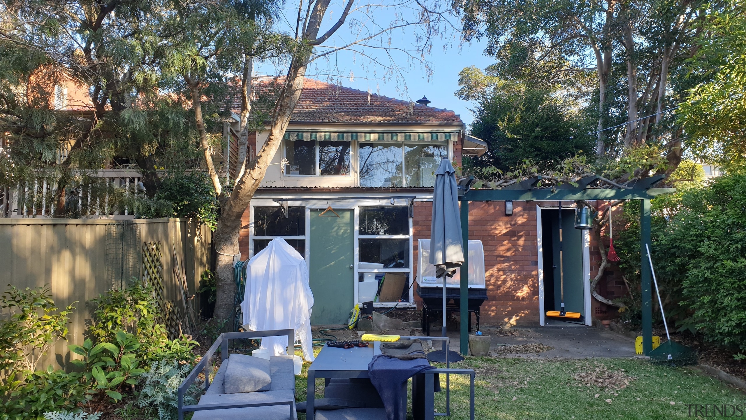 Before: the rear of the home prior to 