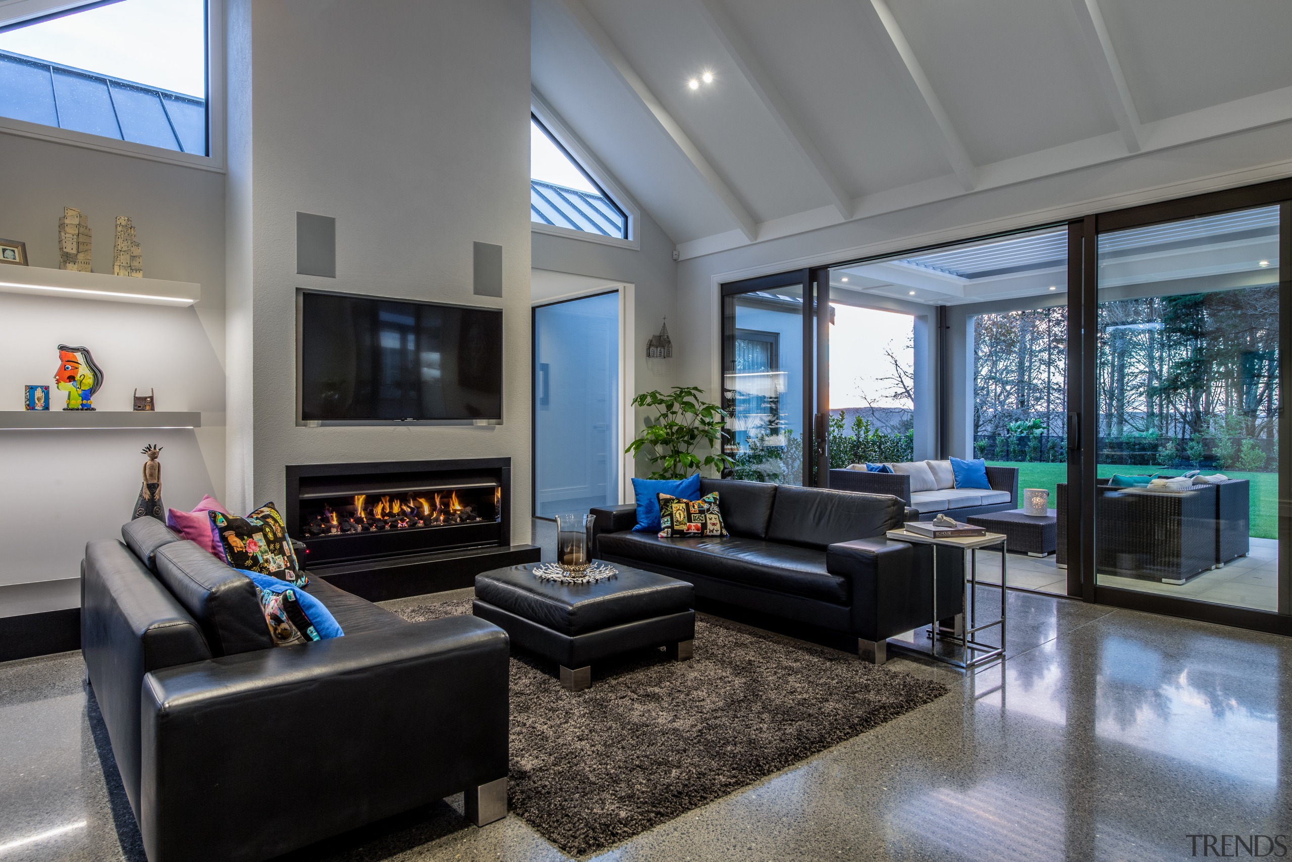 ​​​​​​​This informal living space has ceiling beams that 
