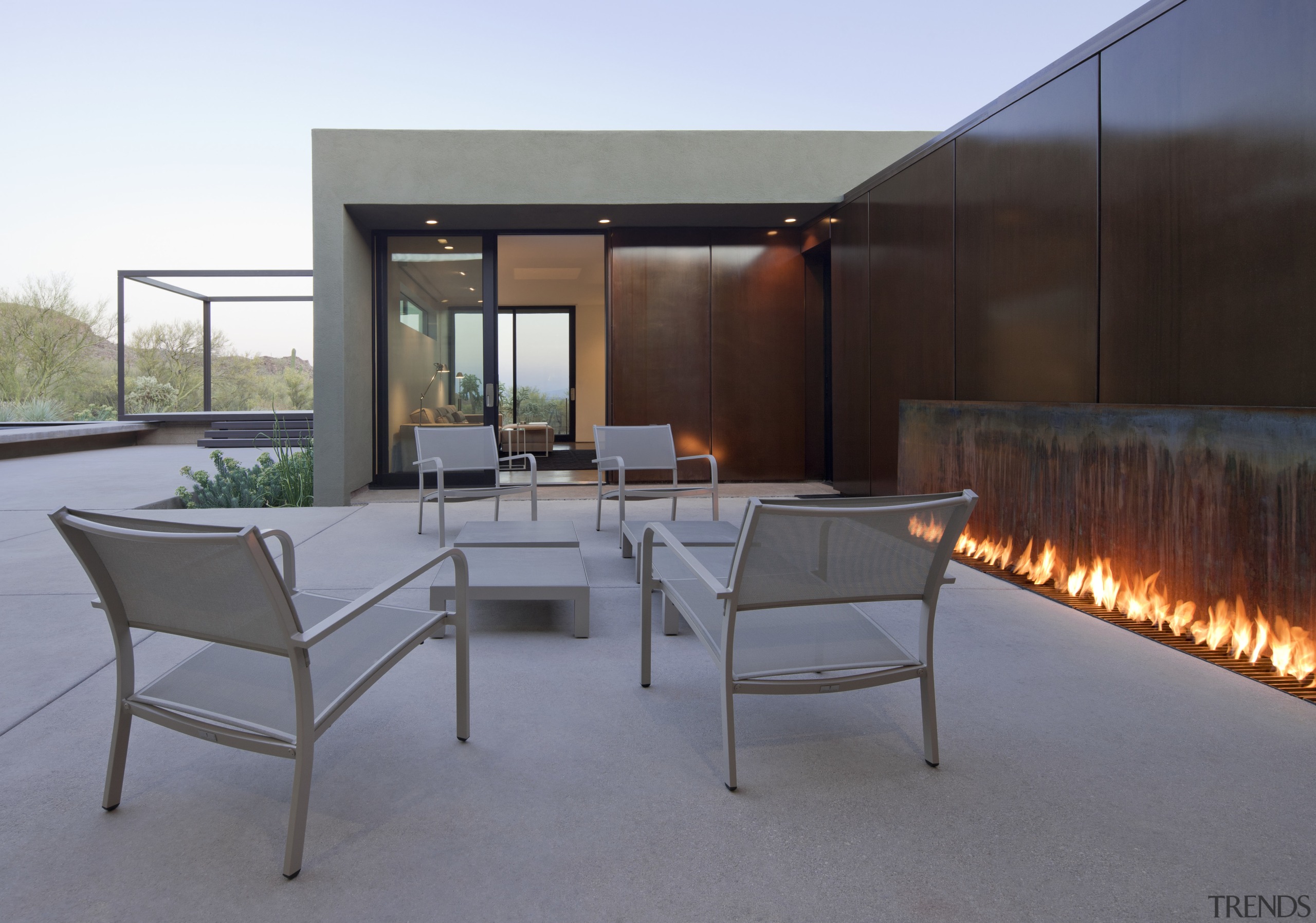 Alfresco living in this desert house is enhanced architecture, furniture, house, interior design, real estate, roof, table, gray