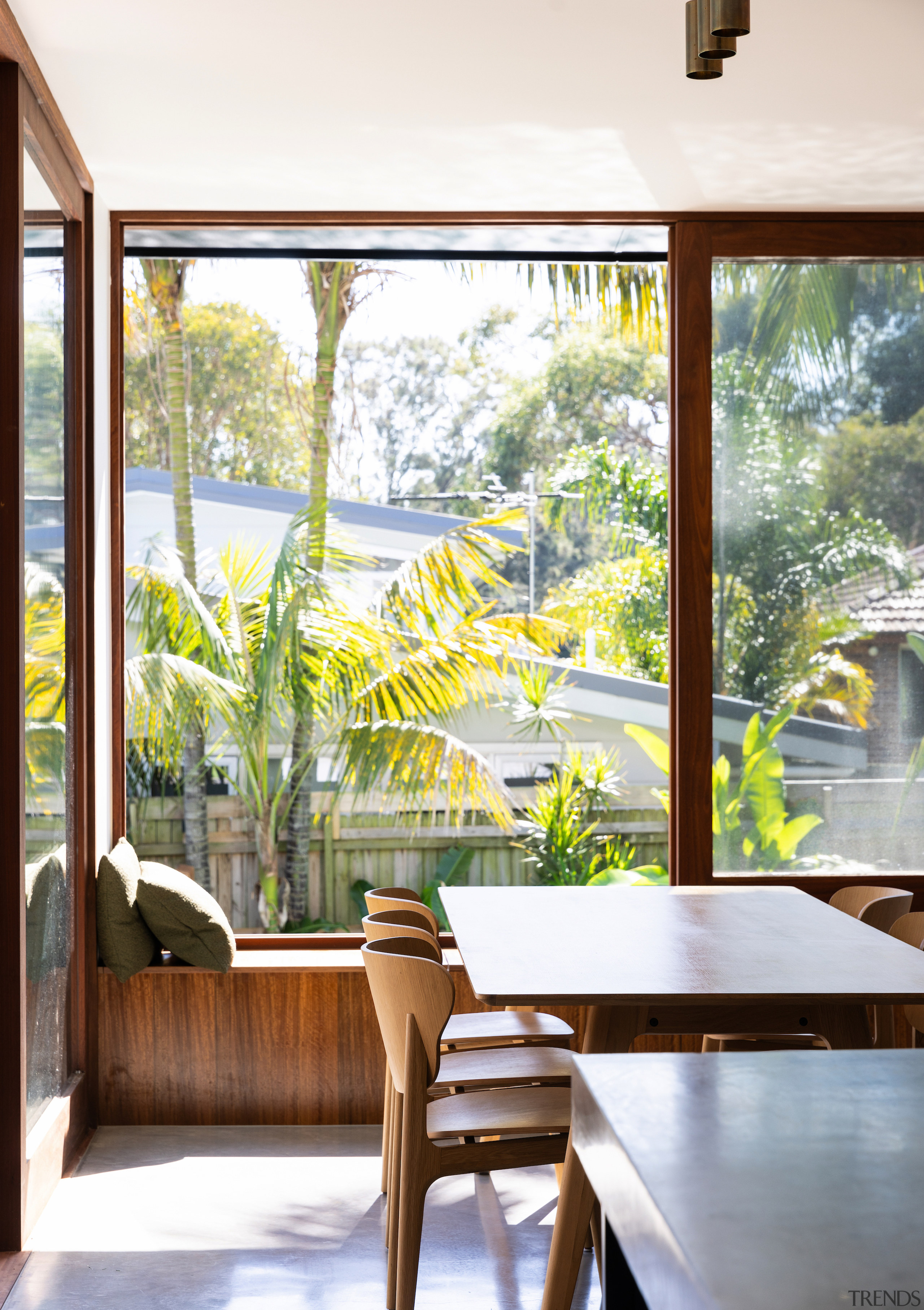 Kitchen island, dining table, cosy window reading nook 