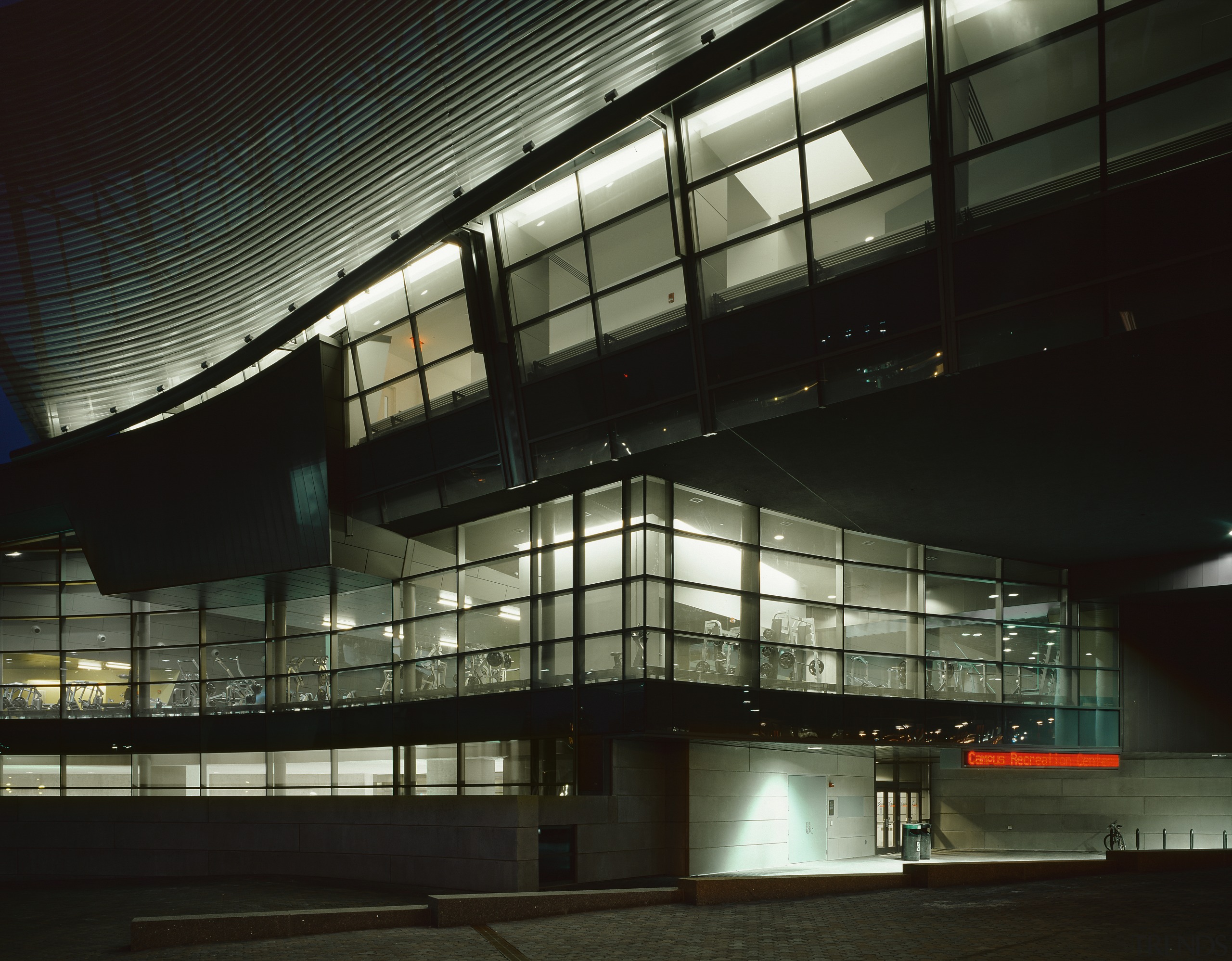 An exterior view of the complex. - An airport terminal, architecture, building, convention center, corporate headquarters, daylighting, headquarters, metropolis, metropolitan area, night, performing arts center, structure, black