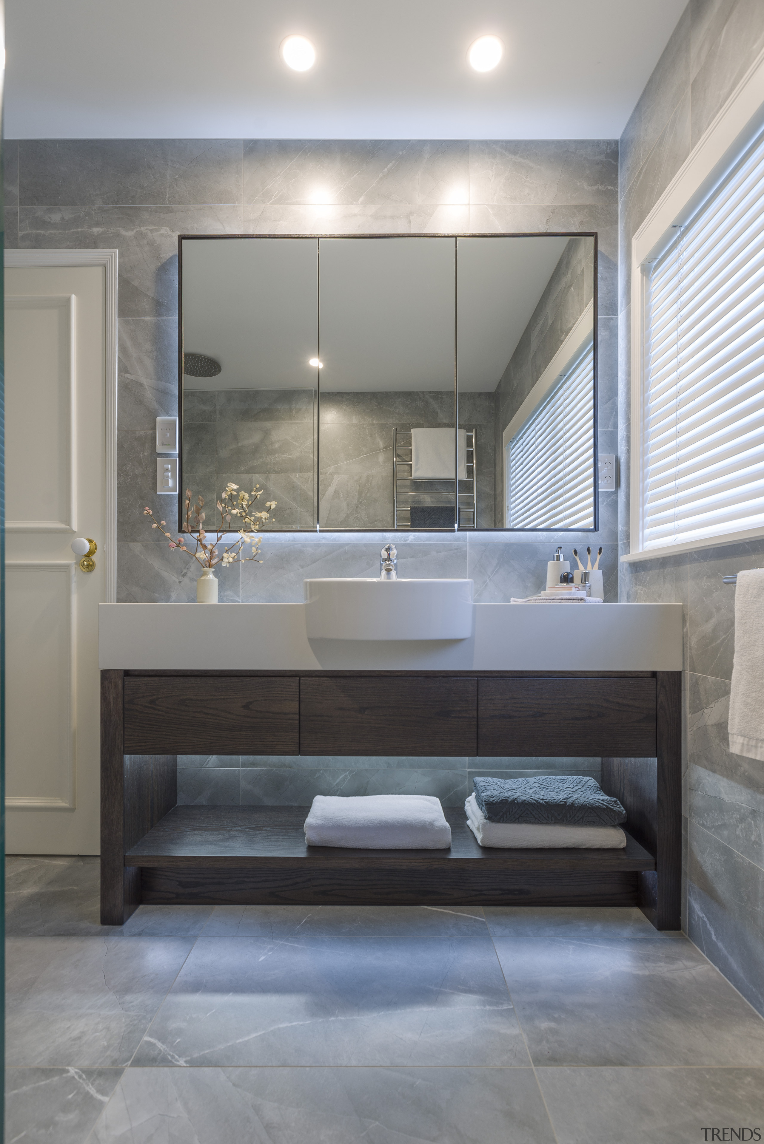 Three mirror cabinets and three boys to use architecture, bathroom, bathtub, building, ceiling, floor, flooring, furniture, glass, home, house, interior design, lighting, marble, material property, plumbing fixture, property, real estate, room, tap, tile, gray