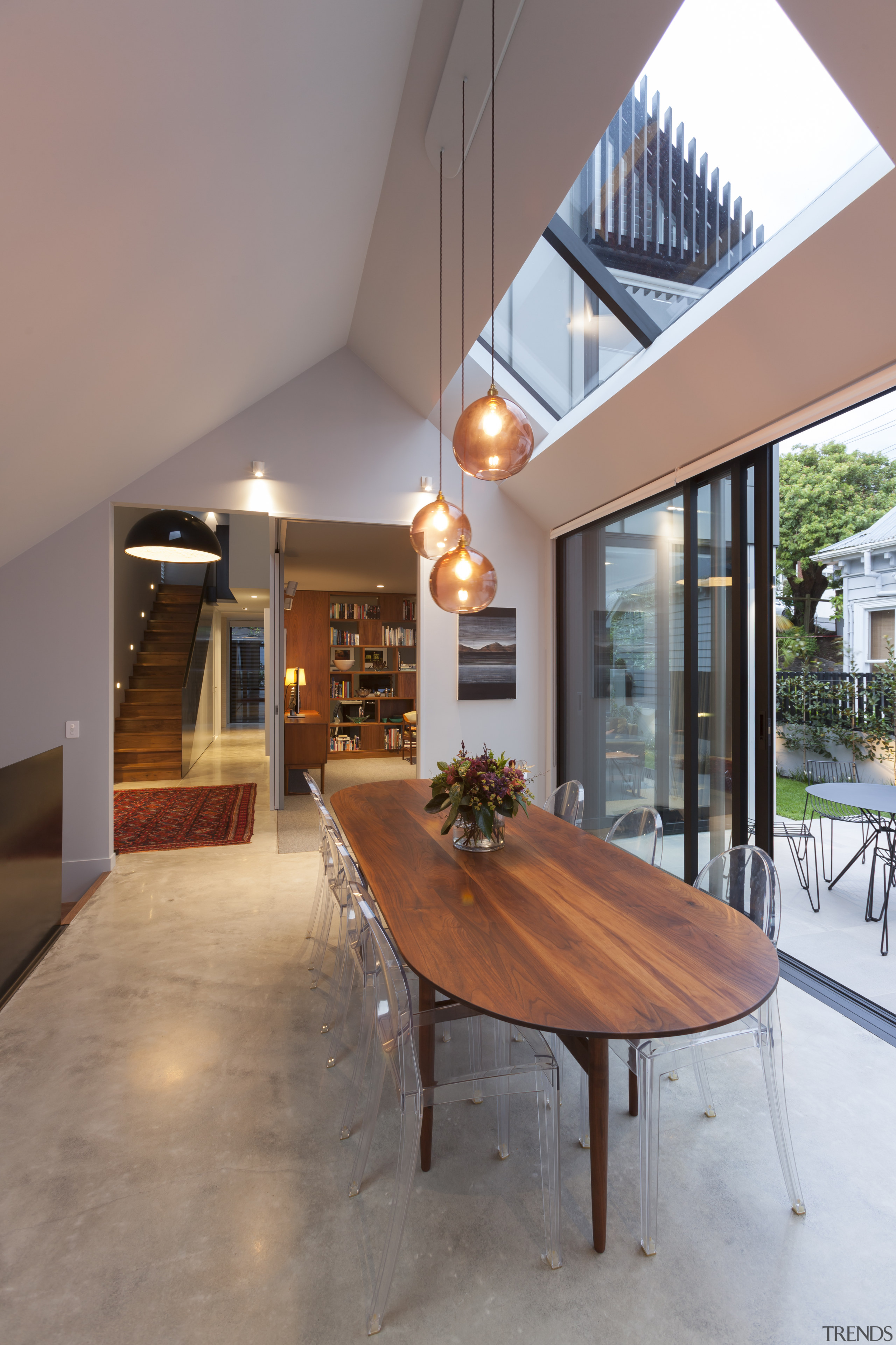 The garden arrangement formed along the northern elevation apartment, architecture, building, ceiling, daylighting, dining room, floor, flooring, furniture, hardwood, home, house, interior design, living room, loft, property, real estate, residential area, roof, room, table, wood, wood flooring, gray