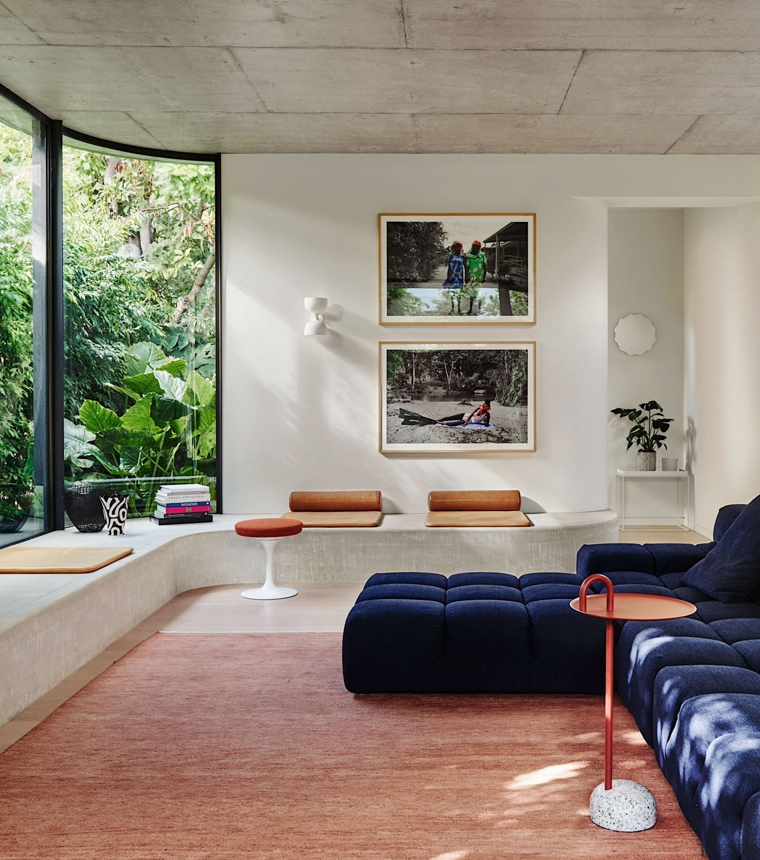 A curved window seat follows the rounded corner 