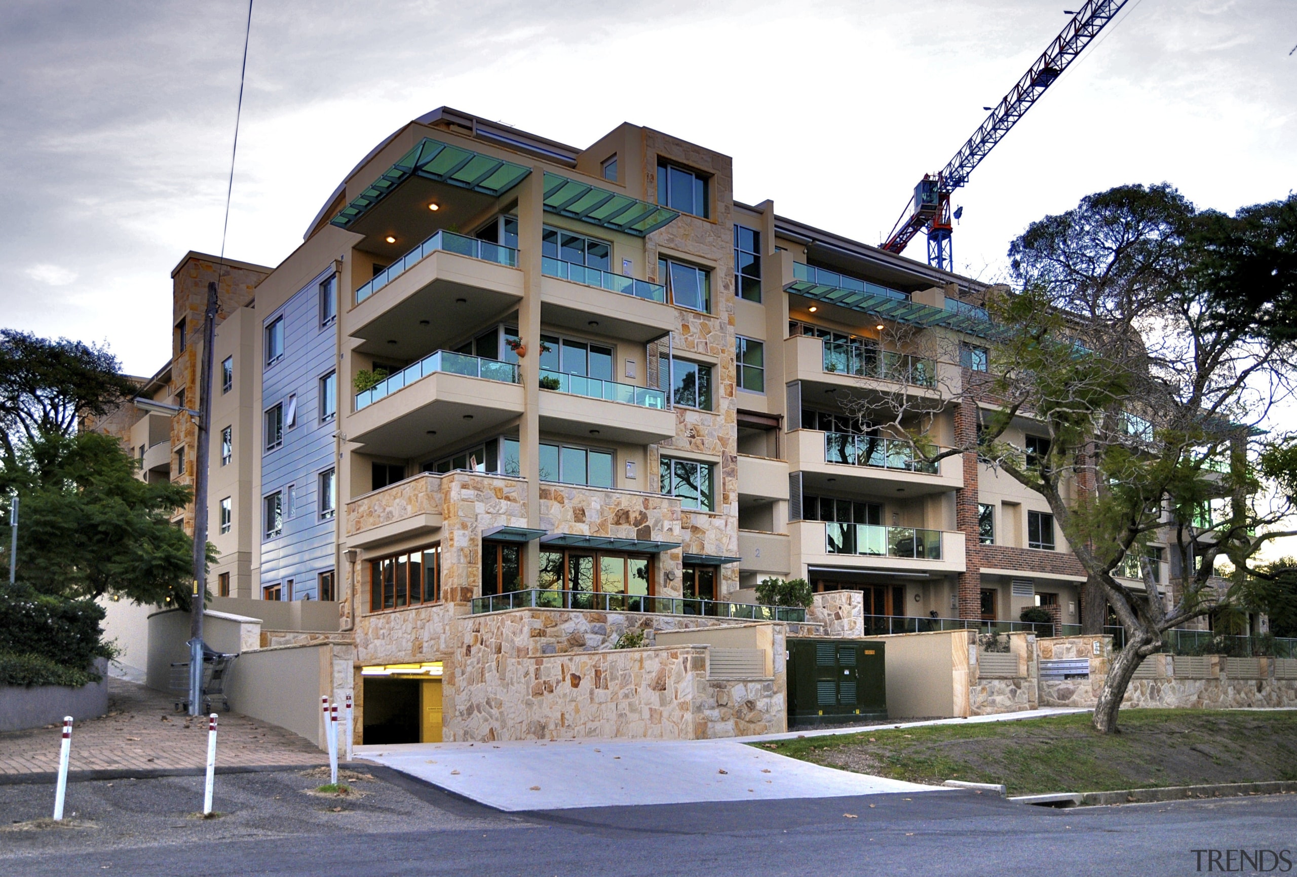 Exterior view of the Lindfield Apartments which were apartment, architecture, building, condominium, facade, home, house, mixed use, neighbourhood, property, real estate, residential area, tower block, tree, window, white