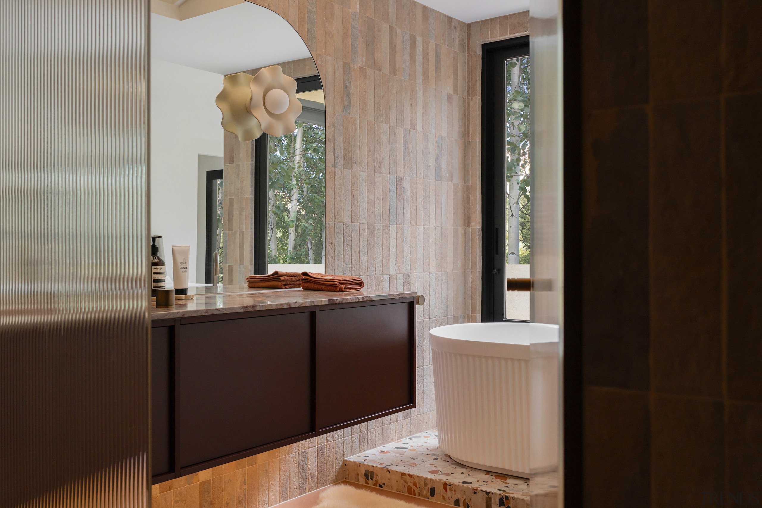 The earthy terracotta tile was selected to pull 