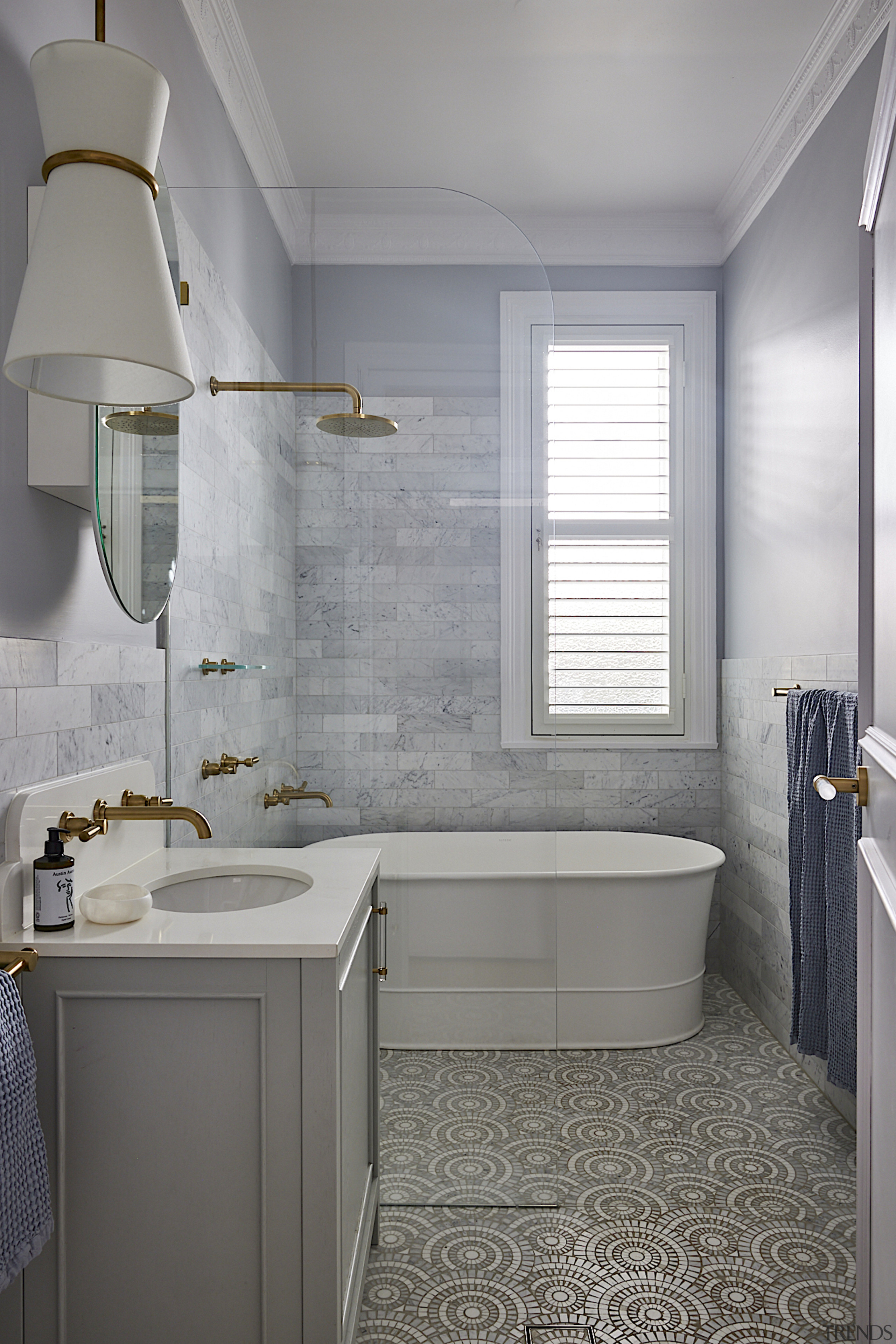 The reworked bathroom with freestanding character tub and 