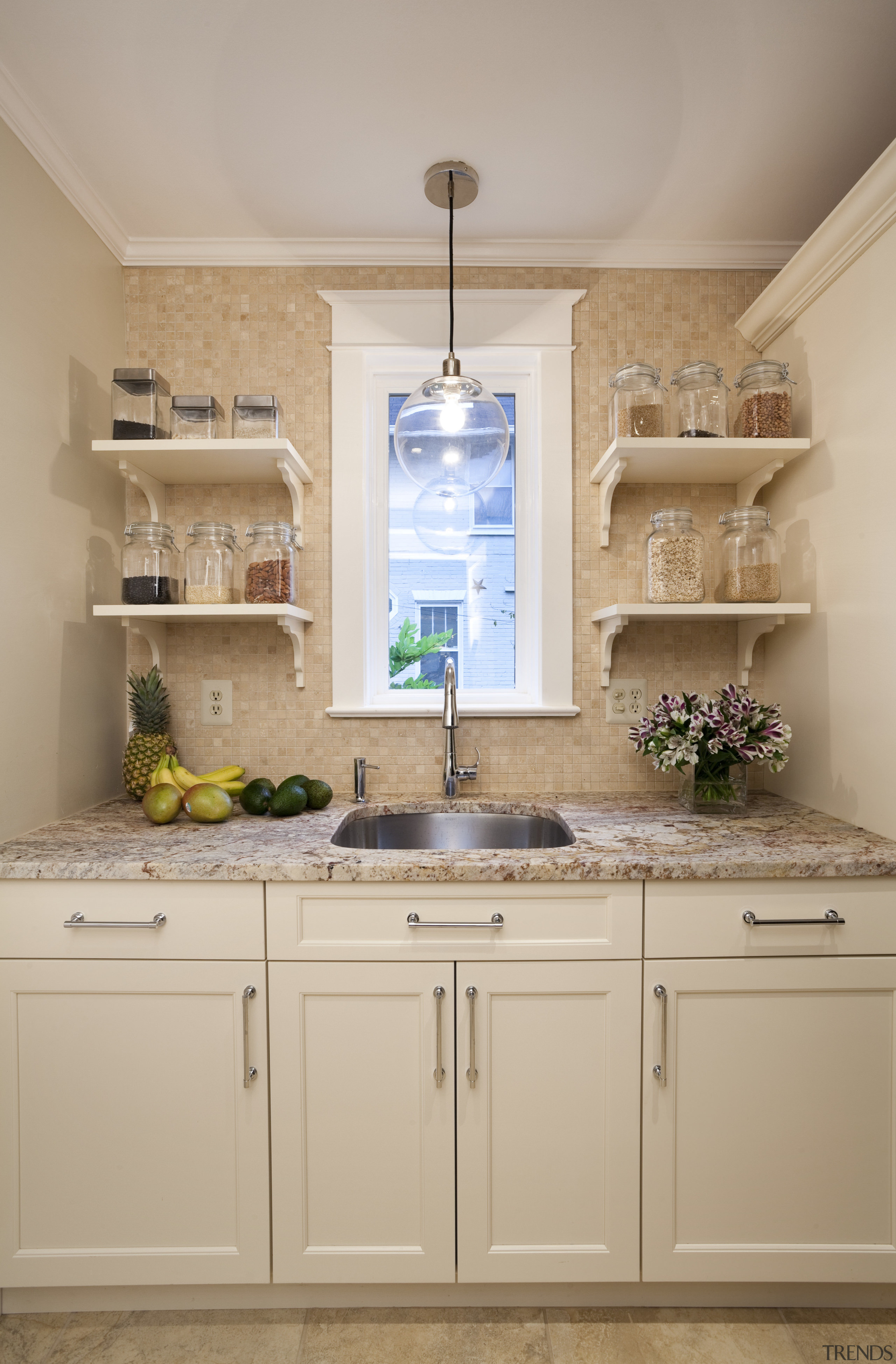 This kitchen was designed by Nadia Subaran of bathroom, cabinetry, countertop, cuisine classique, home, interior design, kitchen, room, sink, wall, orange