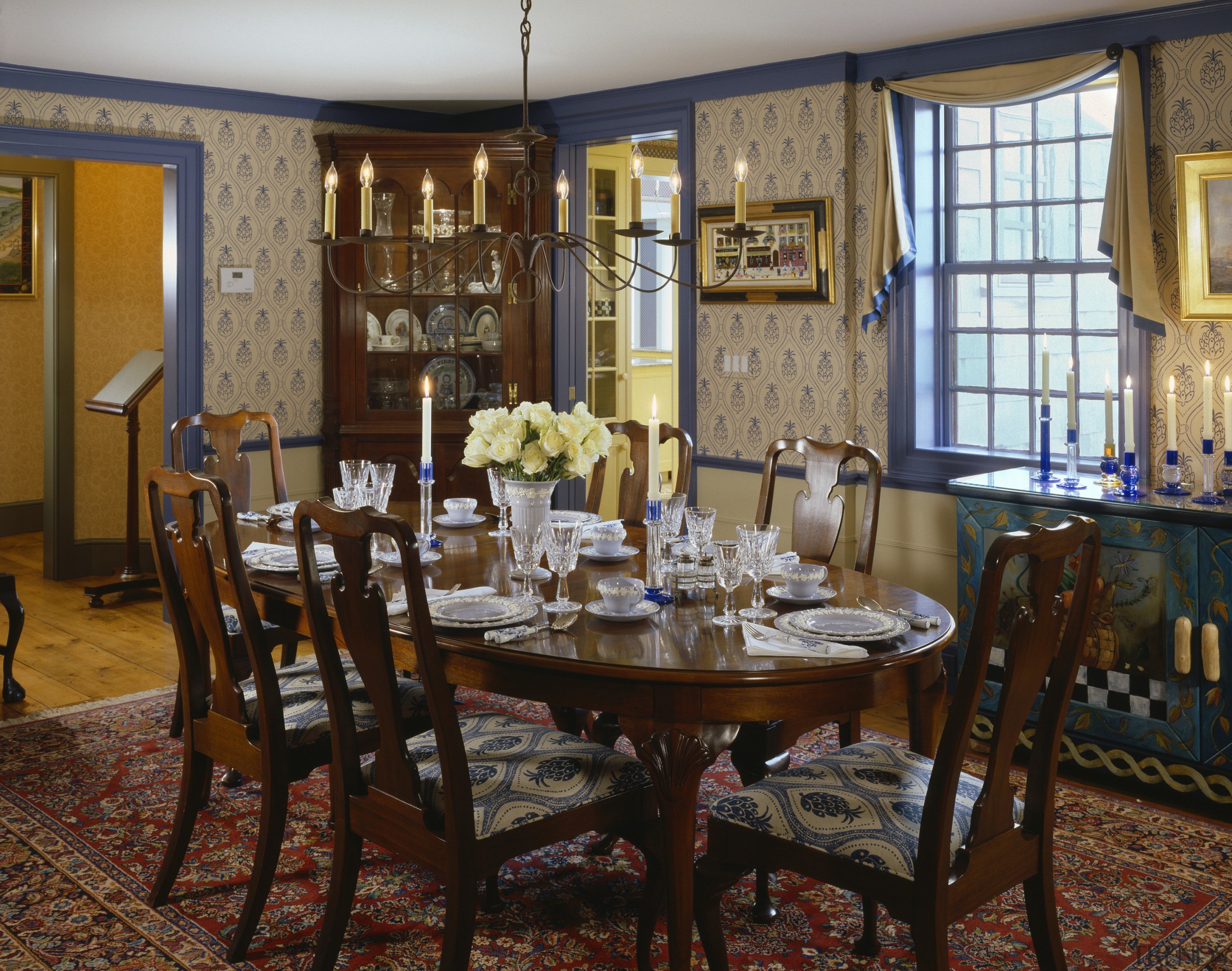 View of the formal dining room with dark-stained dining room, furniture, home, house, interior design, real estate, restaurant, room, table, brown