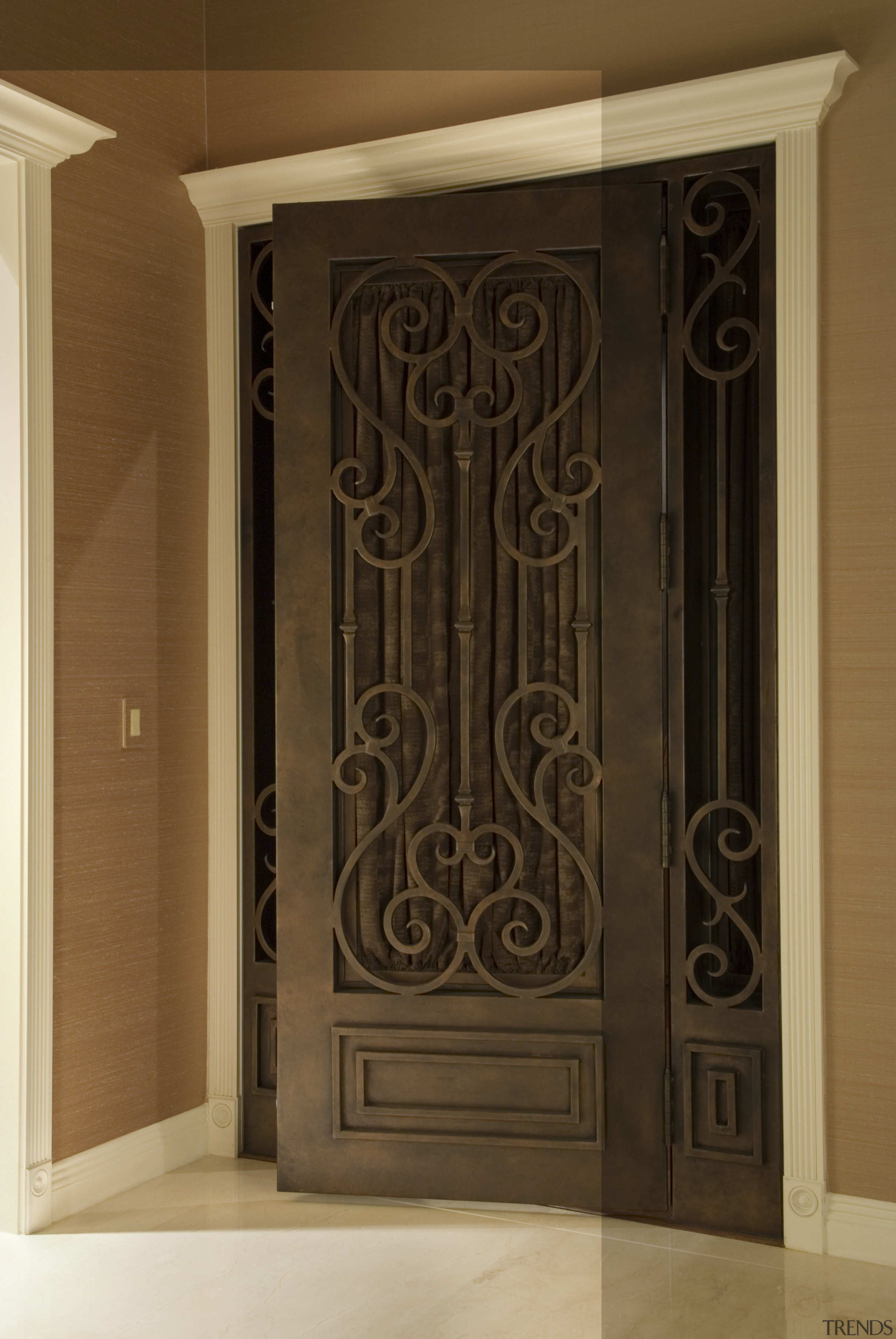 A view of the custome designed doors in door, iron, structure, brown