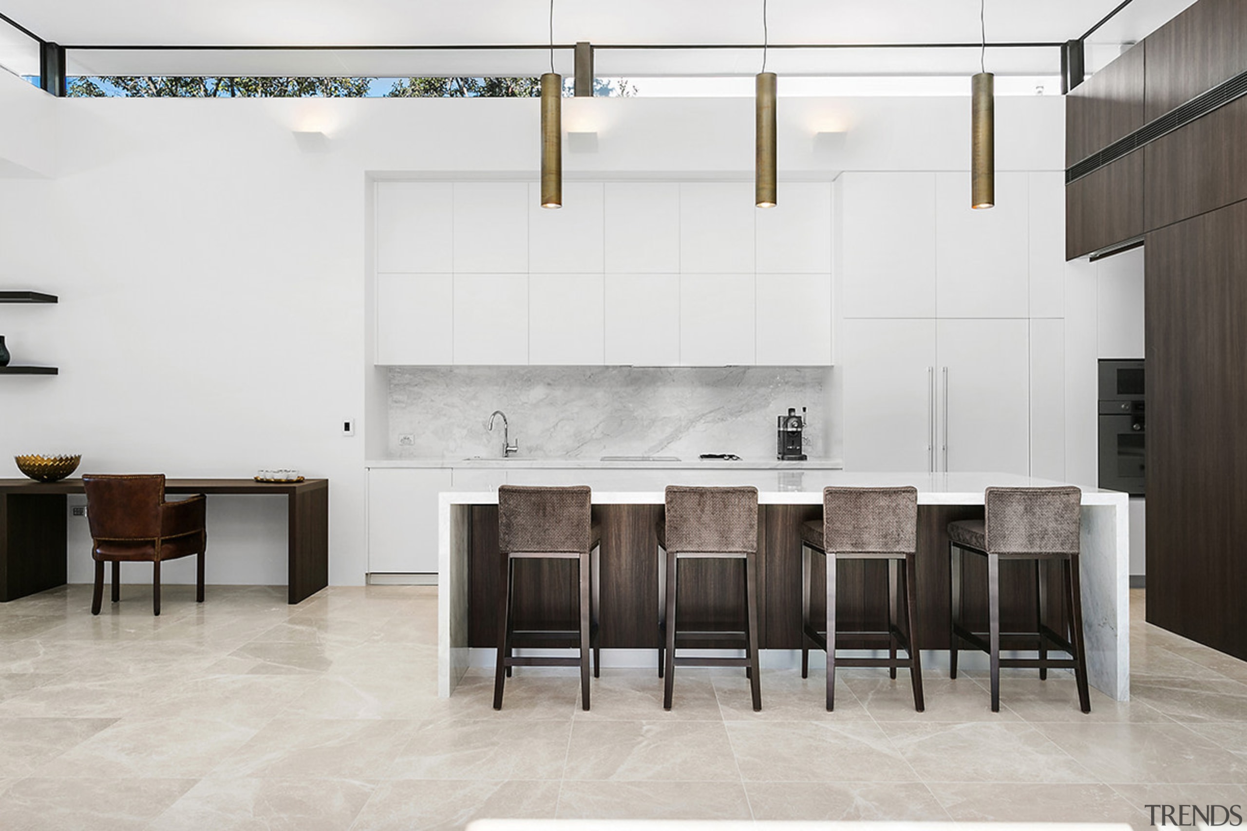 Tall order – this kitchen achieves drama through chair, floor, flooring, furniture, interior design, table, wall, white