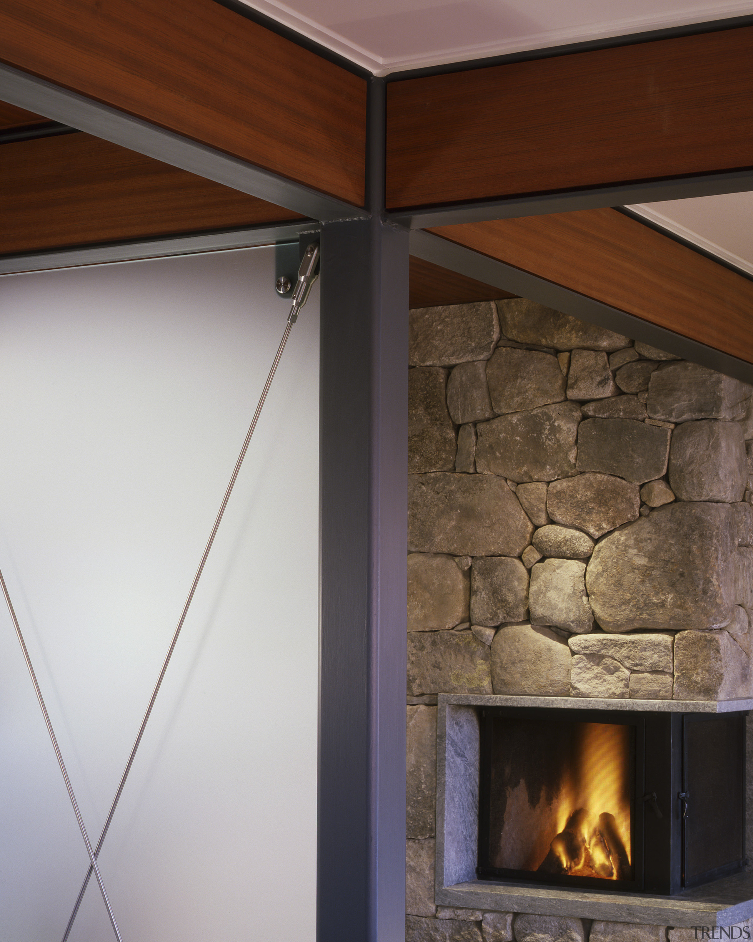 View of fireplace built with local Maine granite ceiling, fireplace, hearth, house, interior design, wall, wood, gray