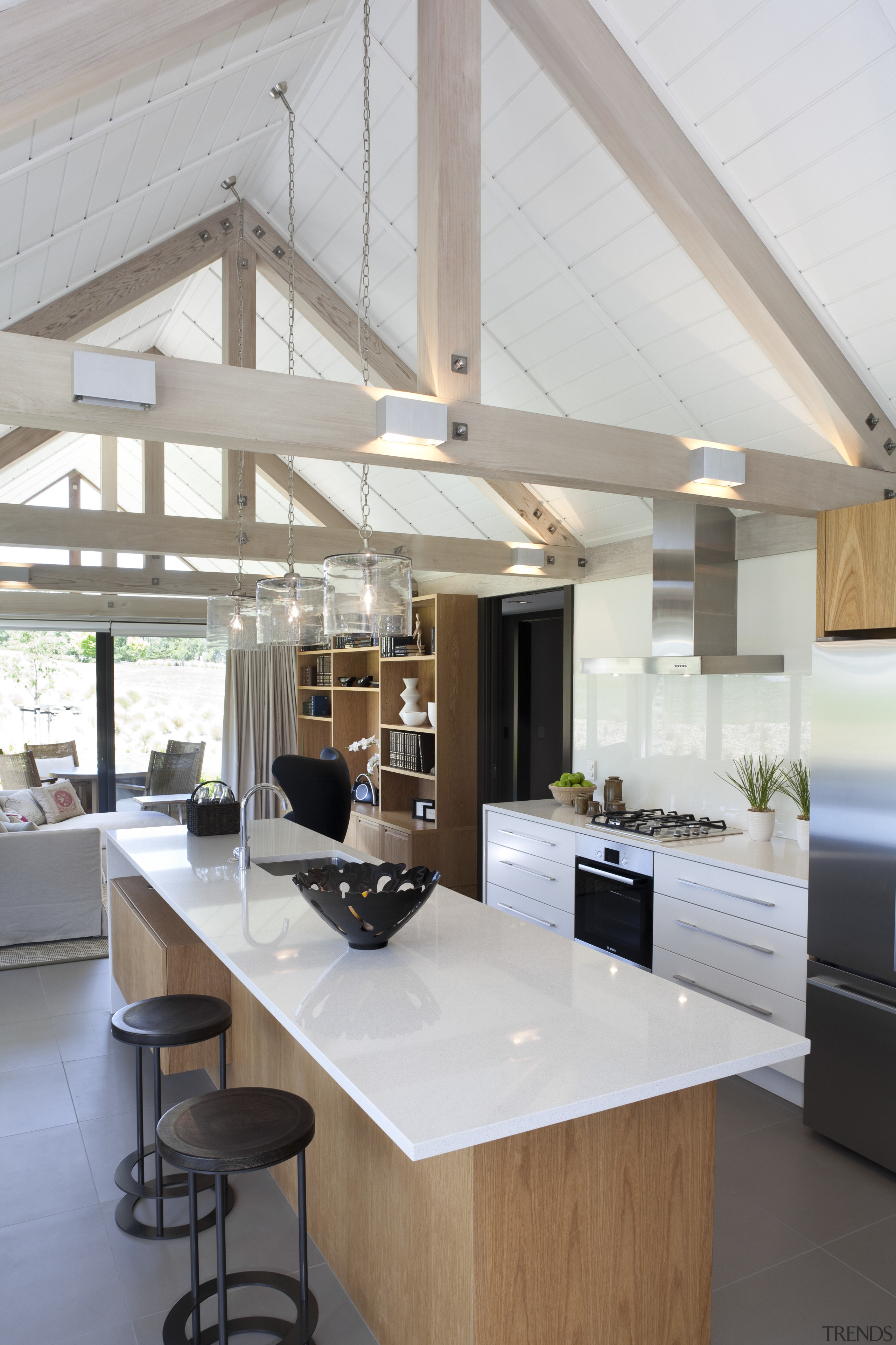 This home was designed by Mason &amp; Wales architecture, beam, ceiling, countertop, daylighting, house, interior design, kitchen, table, gray