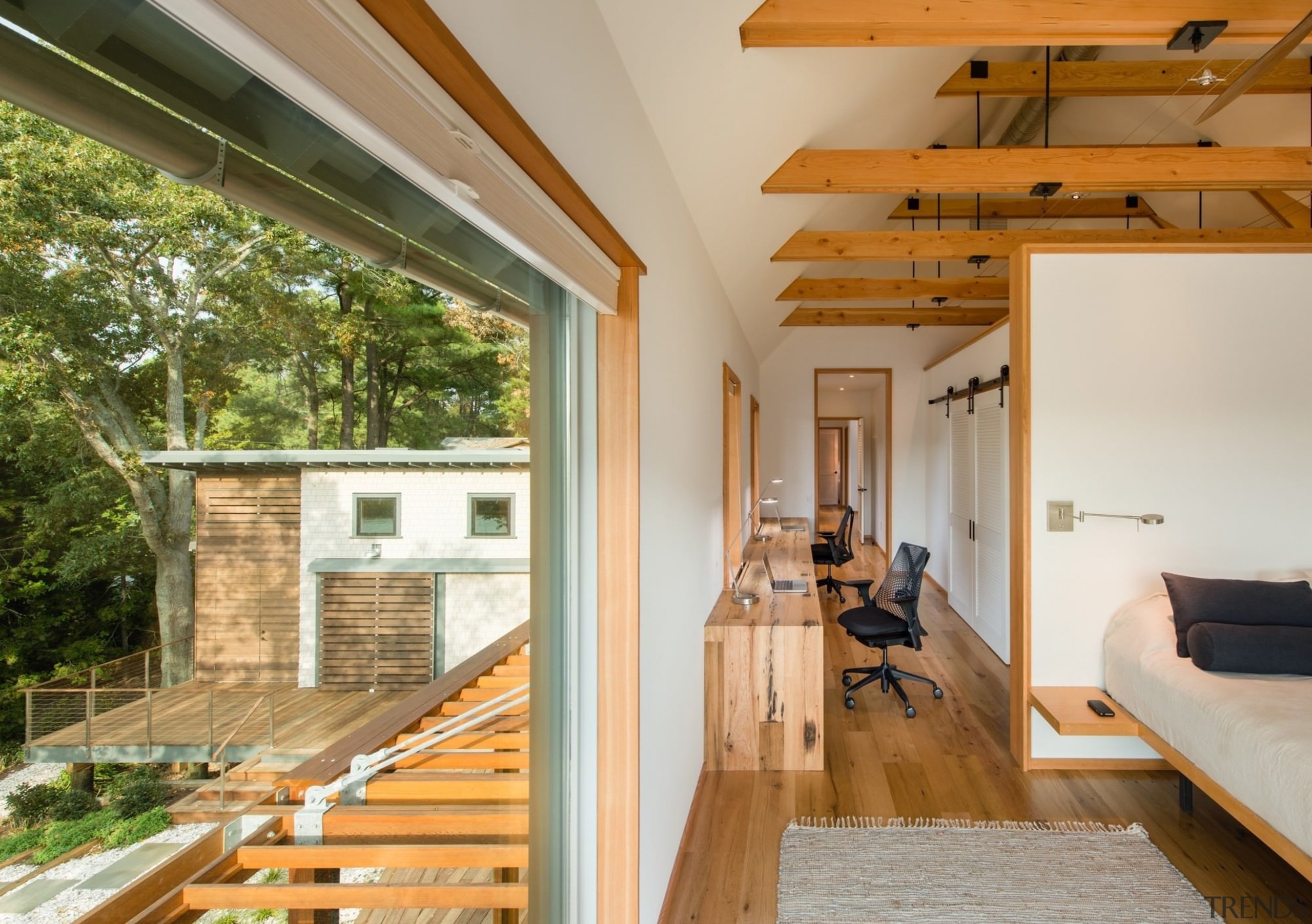 This hallway features an office along one wall architecture, ceiling, daylighting, floor, house, interior design, real estate, window, wood, brown