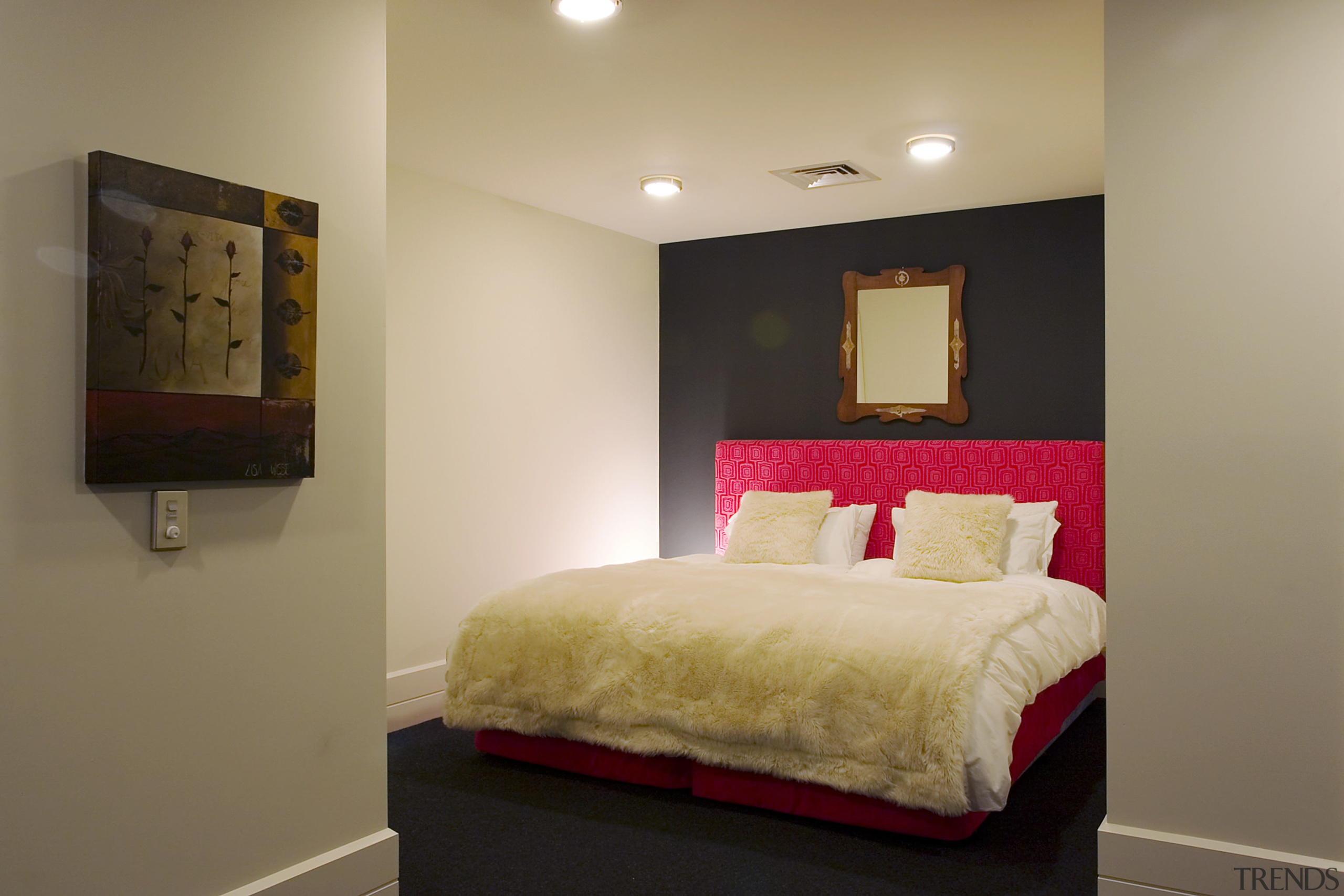 View of the living area featuring cowskin chairs, bed frame, bedroom, ceiling, furniture, home, interior design, property, real estate, room, suite, wall, orange, brown
