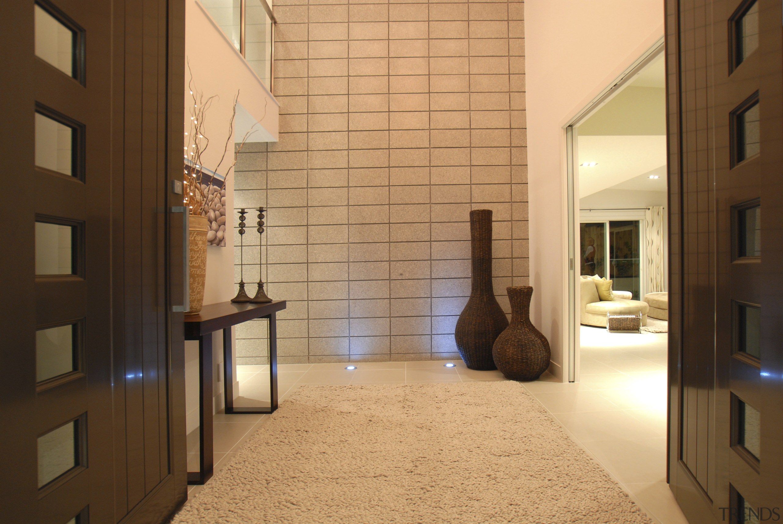 Solid construction using stevenson's DryBlock system gives the apartment, architecture, estate, floor, flooring, home, interior design, lobby, property, real estate, room, window, orange, brown