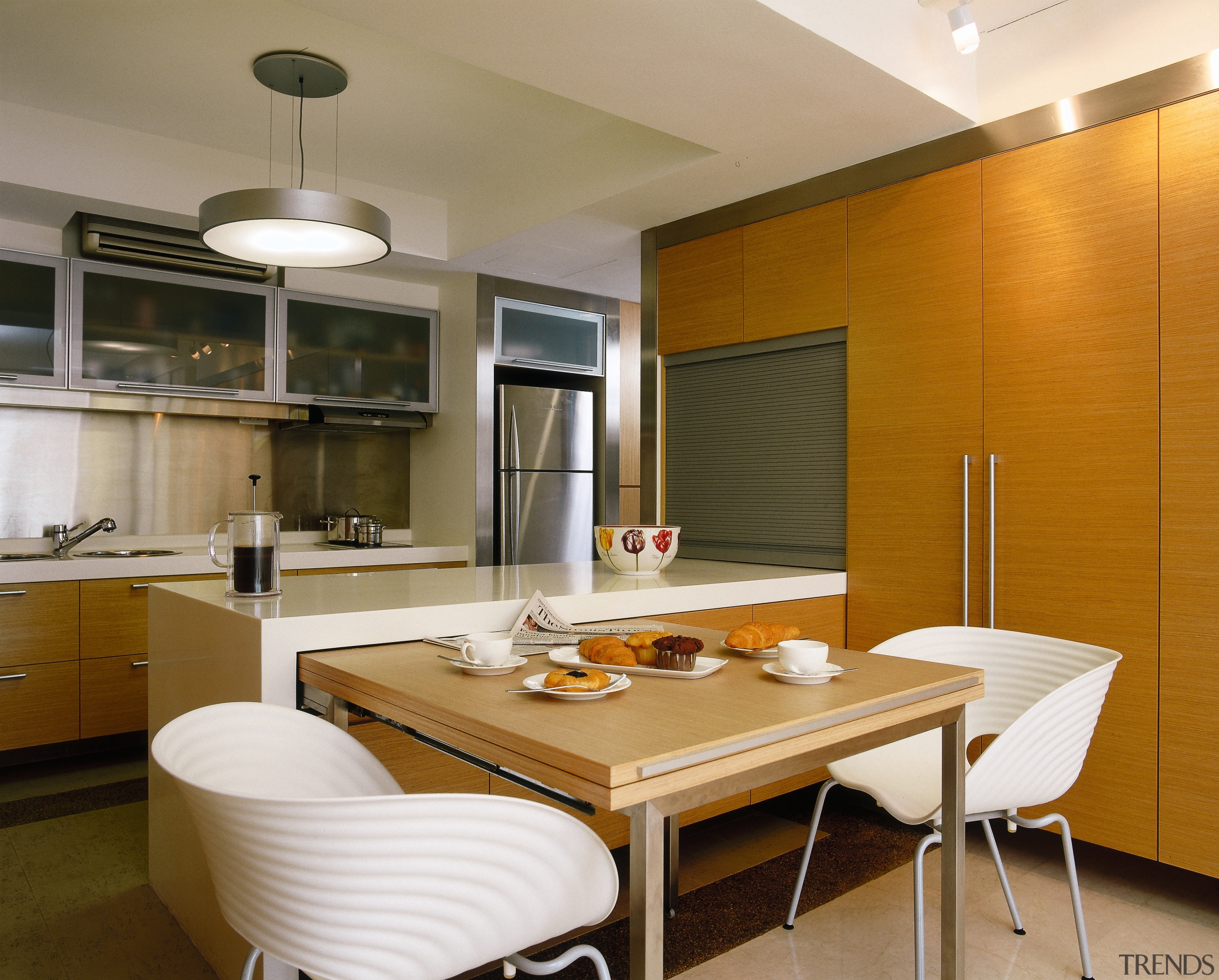 View of the kitchen with slide-out table, polished ceiling, countertop, dining room, interior design, kitchen, real estate, brown