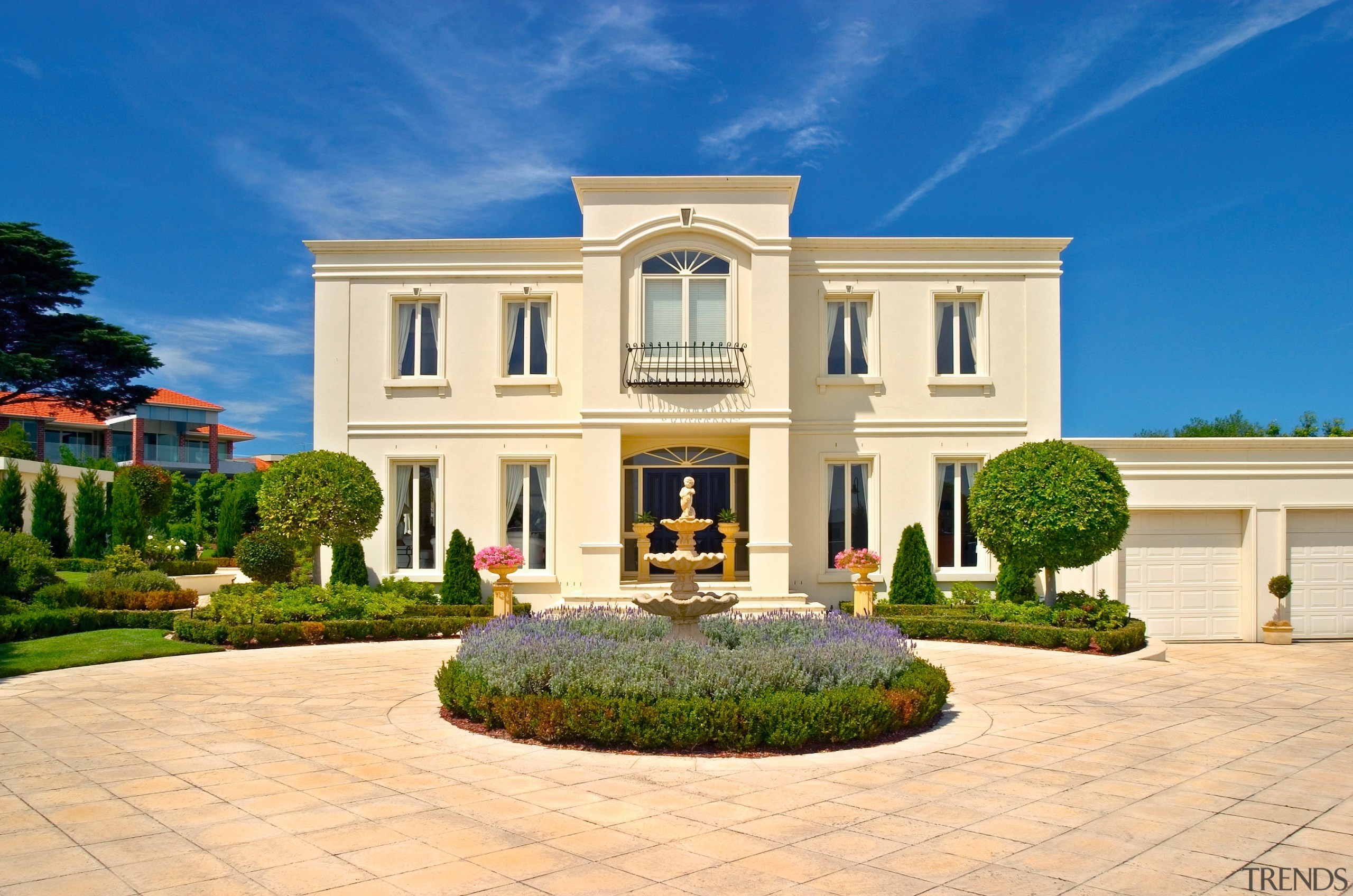 View of the front entrance - View of building, elevation, estate, facade, home, house, landscaping, mansion, official residence, property, real estate, residential area, sky, villa, blue, orange