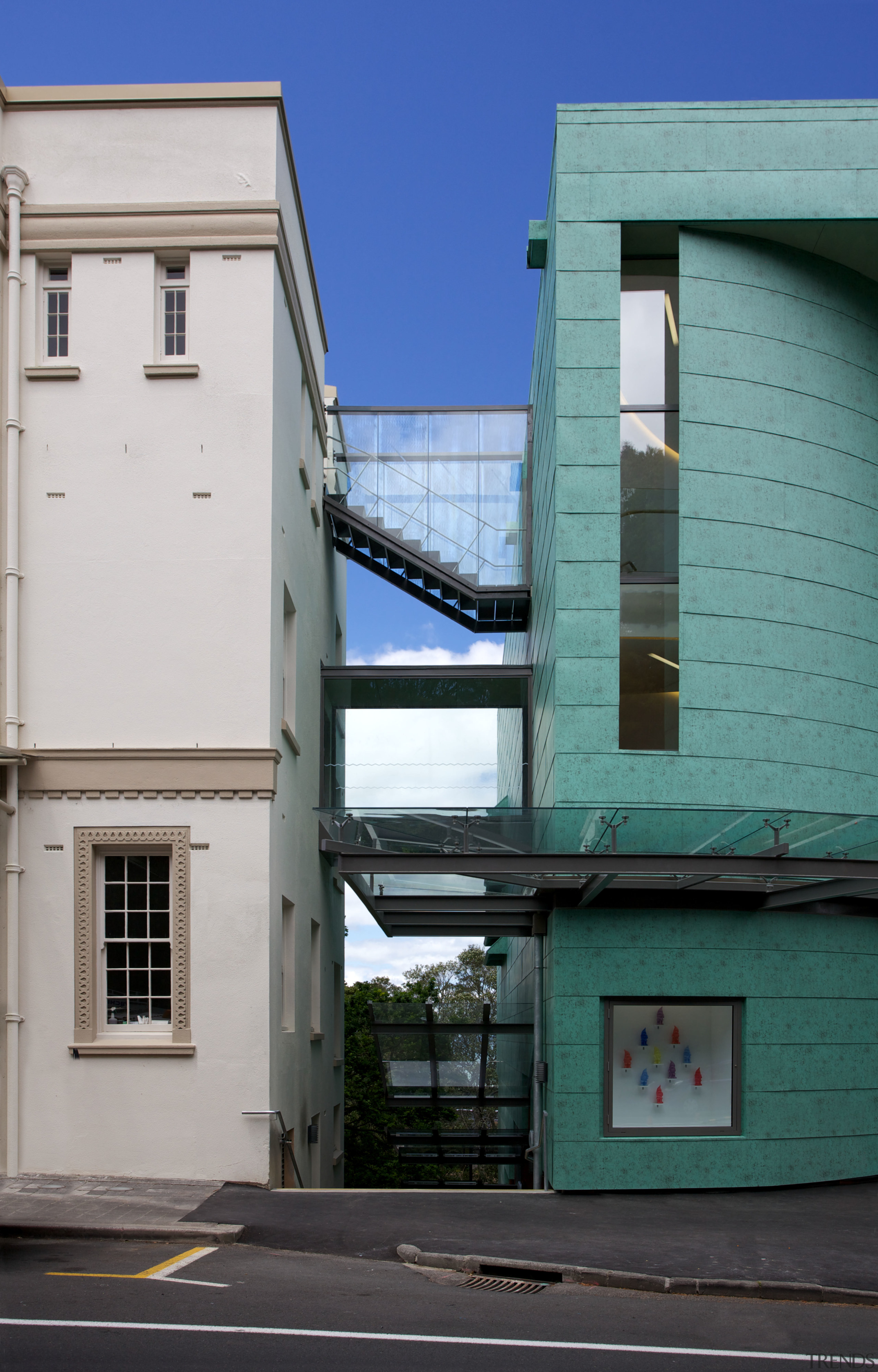 The new Te Uru Waitakere gallery has a apartment, architecture, building, facade, home, house, neighbourhood, residential area, sky, town, wall, window, gray, black